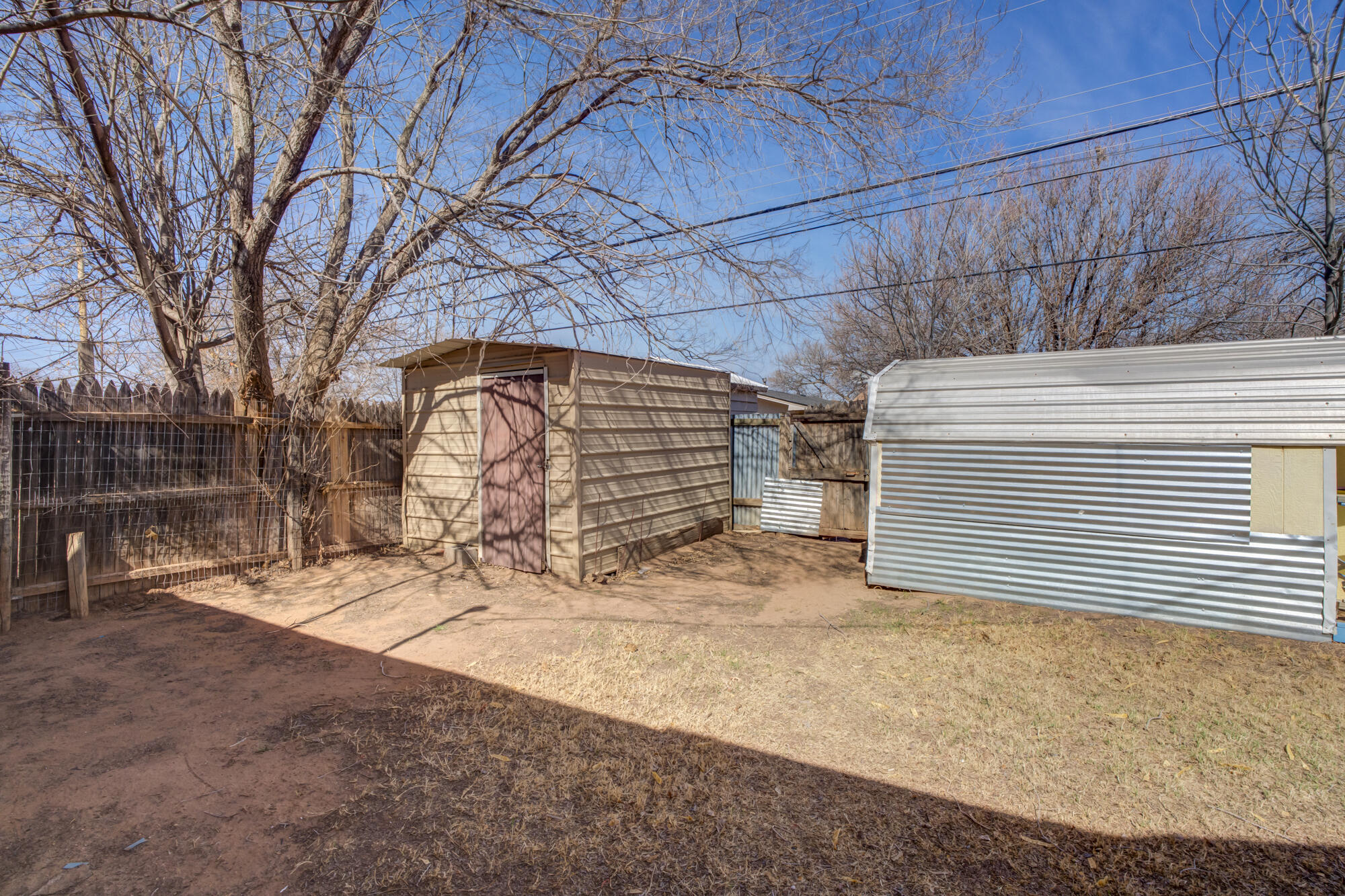 4404 28th Street Lubbock, TX 79410 - Photo 36 of 39 a view of a yard with a tree