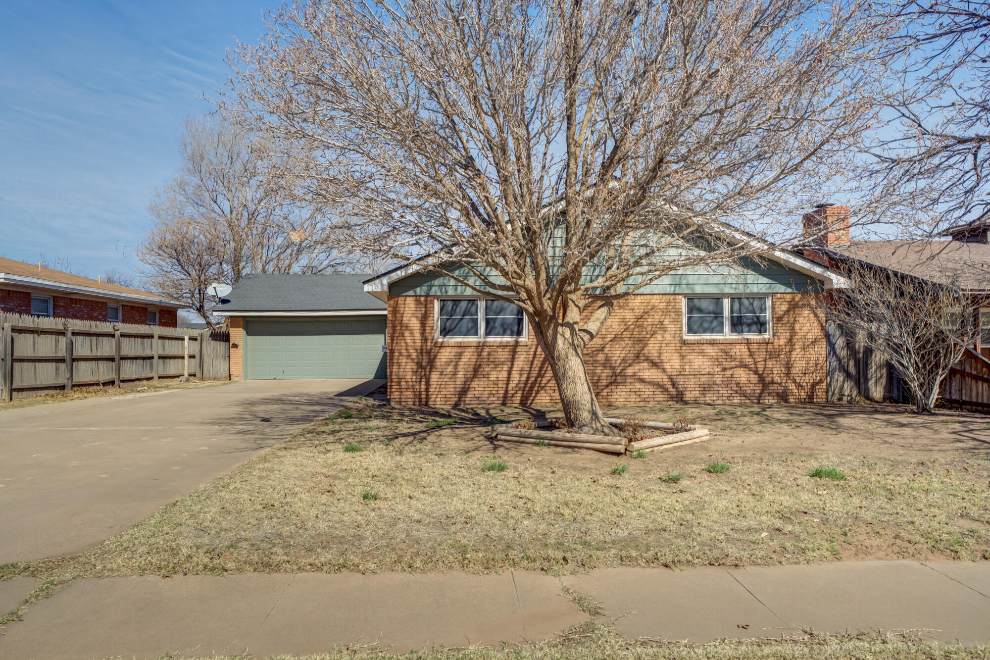 4404 28th Street Lubbock, TX 79410 - Photo 39 of 39 a view of a house with snow on the road