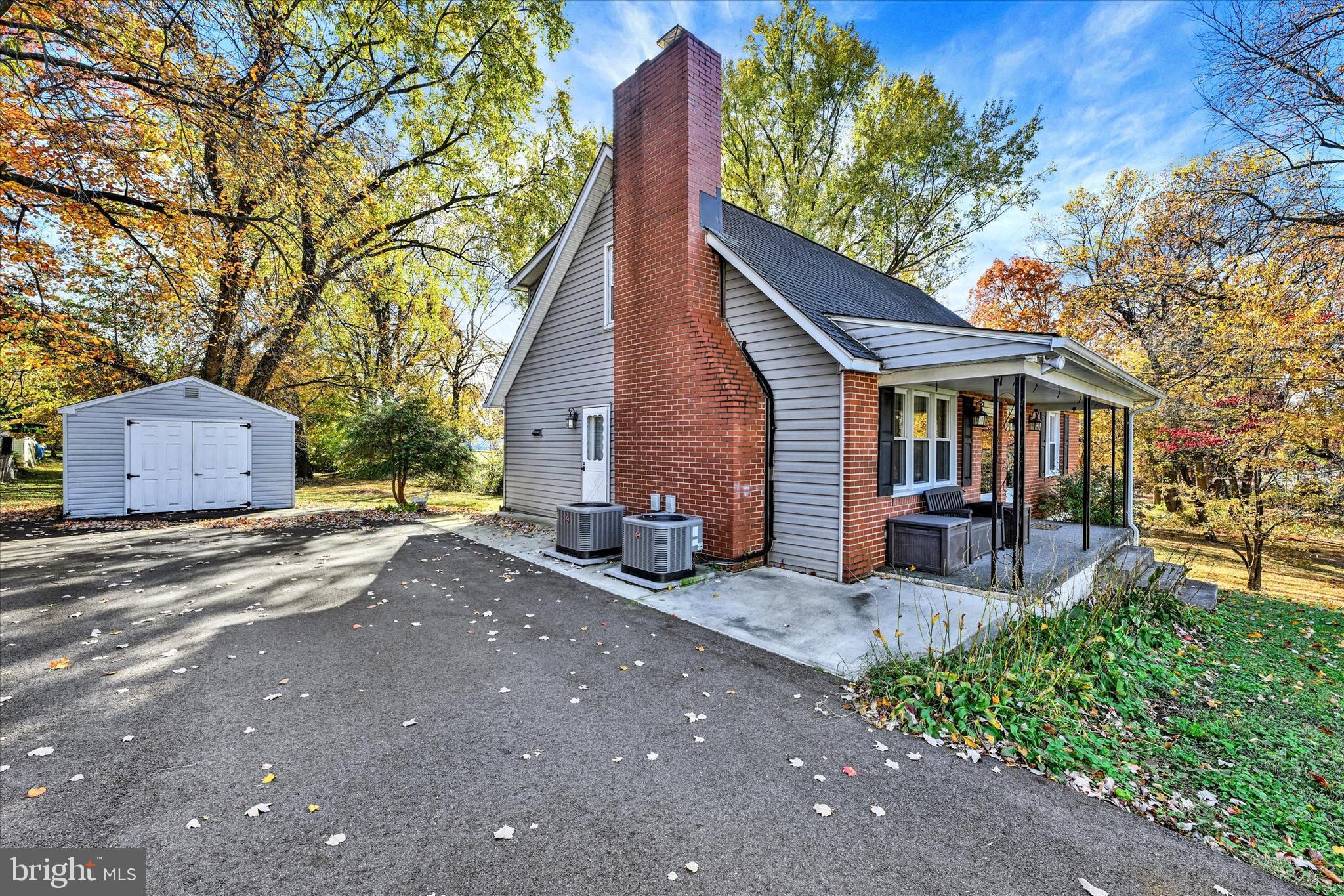 1321 Rustic Avenue Baltimore, MD 21237 - Photo 2 of 28 a view of a house with a yard and sitting area