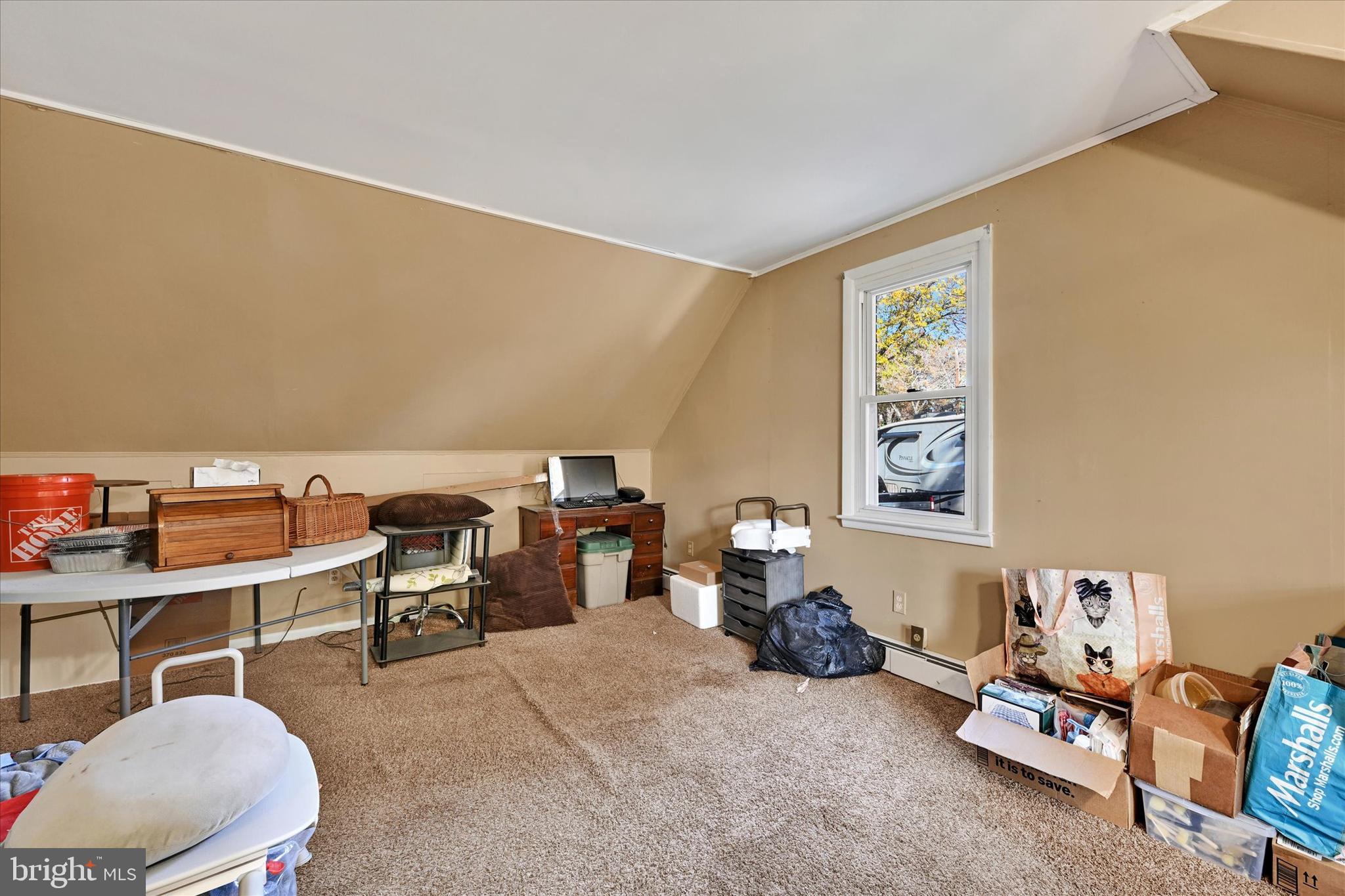 1321 Rustic Avenue Baltimore, MD 21237 - Photo 22 of 28 a living room with furniture and a window