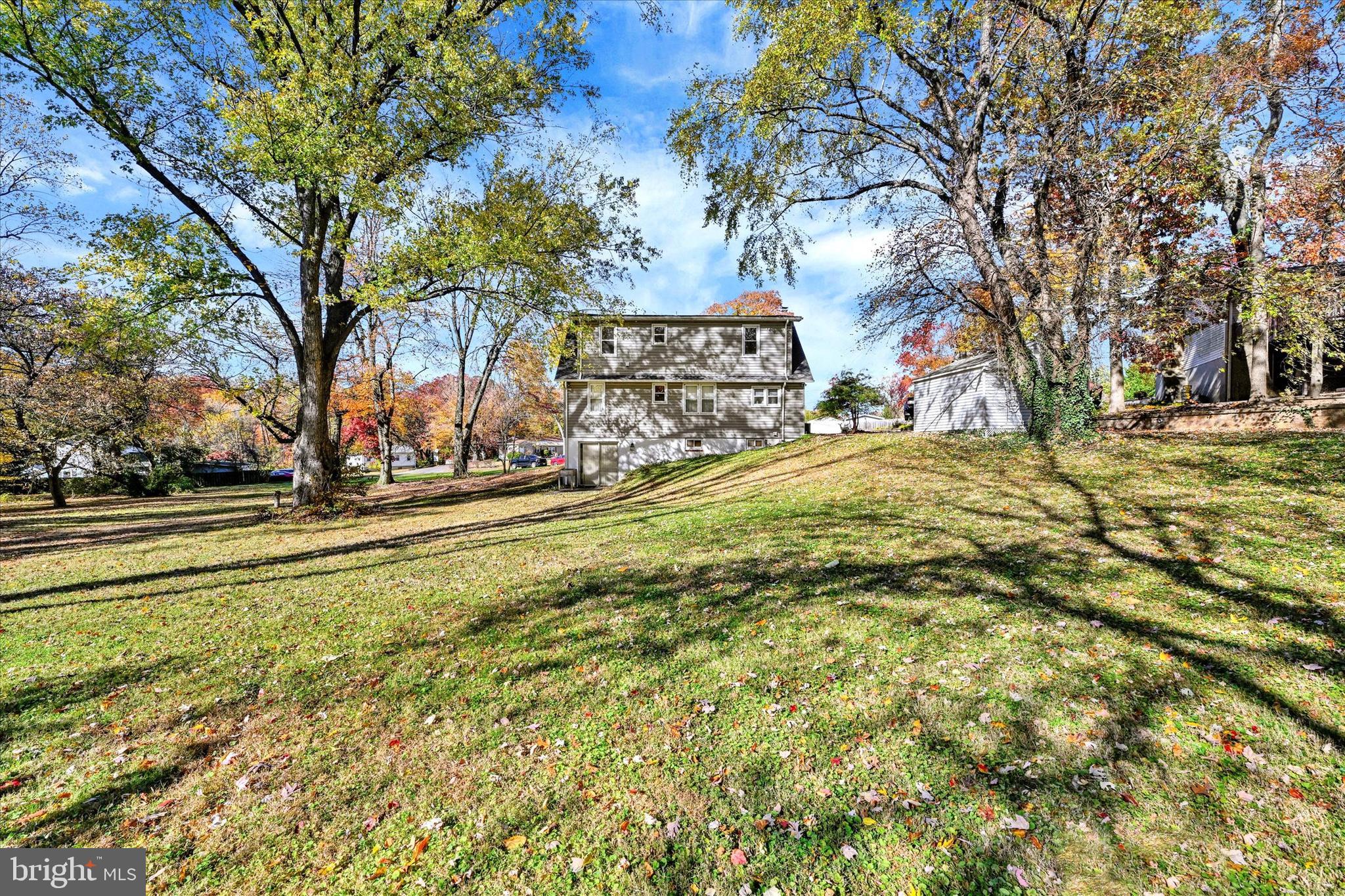 1321 Rustic Avenue Baltimore, MD 21237 - Photo 28 of 28 a view of yard with large tree