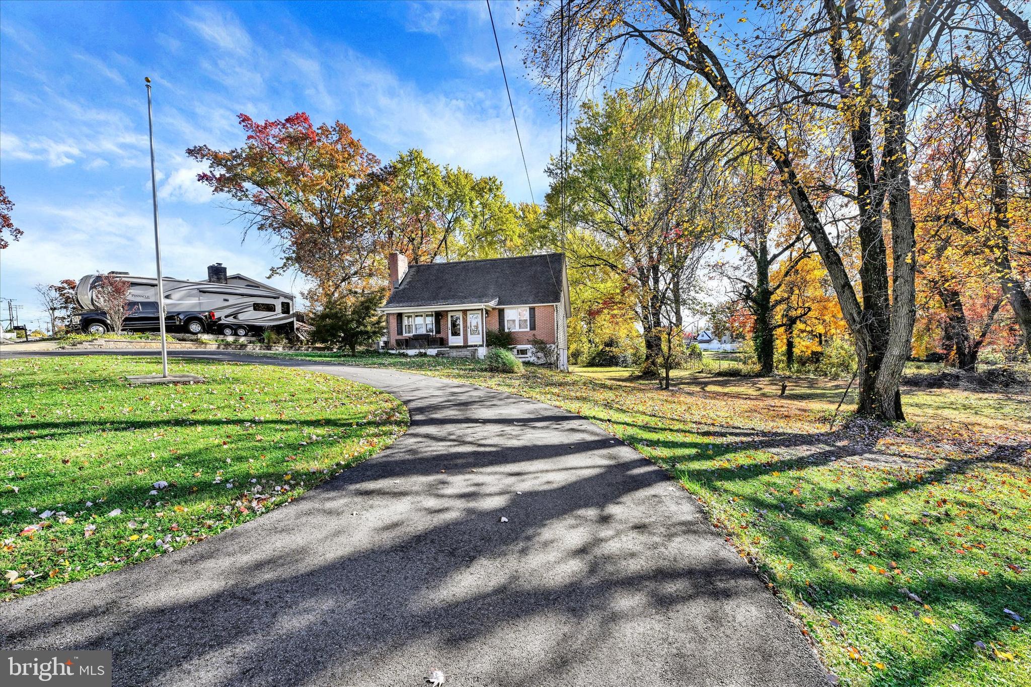 1321 Rustic Avenue Baltimore, MD 21237 - Photo 4 of 28 a view of a park with large trees