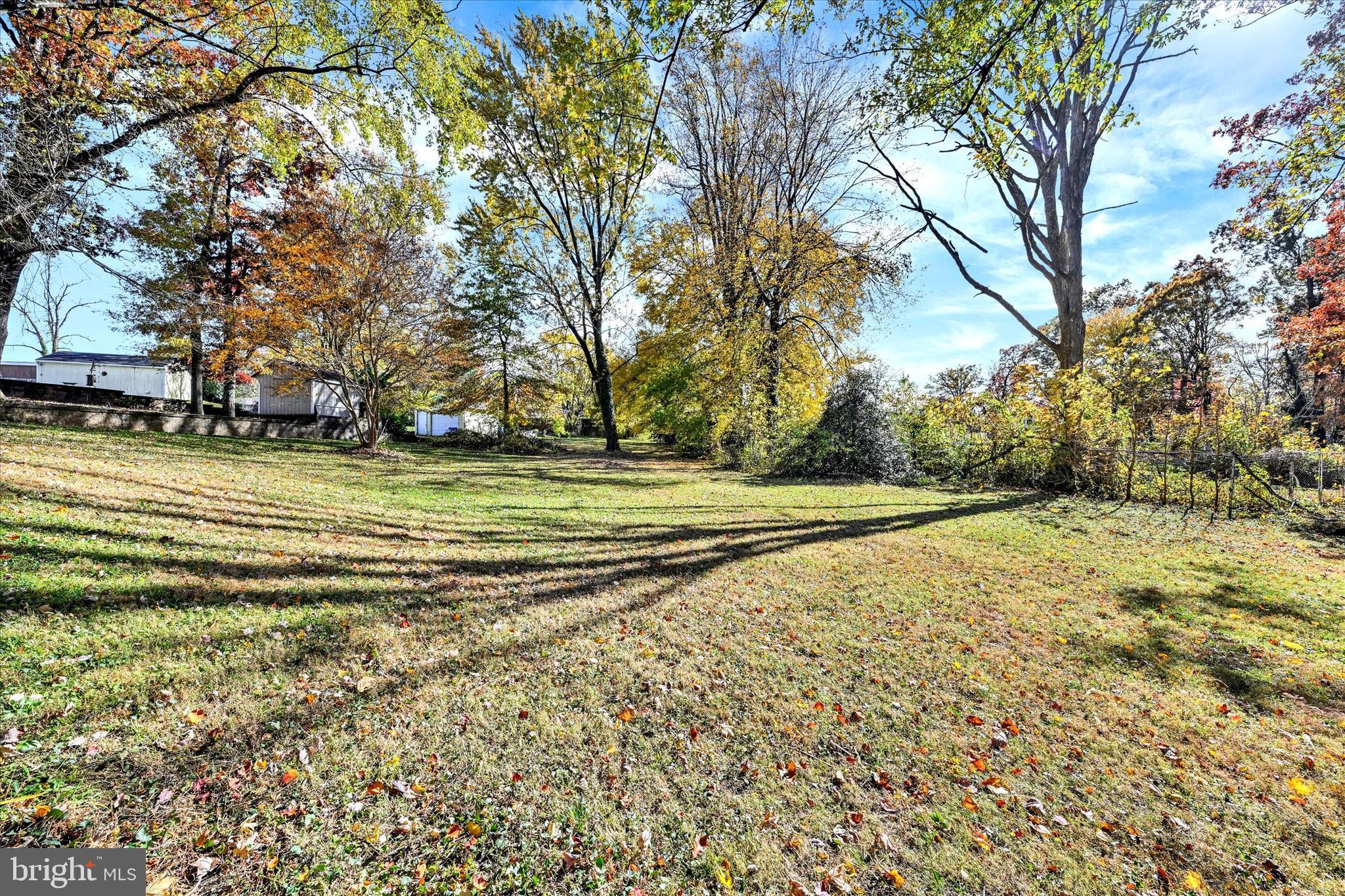 1321 Rustic Avenue Baltimore, MD 21237 - Photo 5 of 28 a view of a playground with basketball court