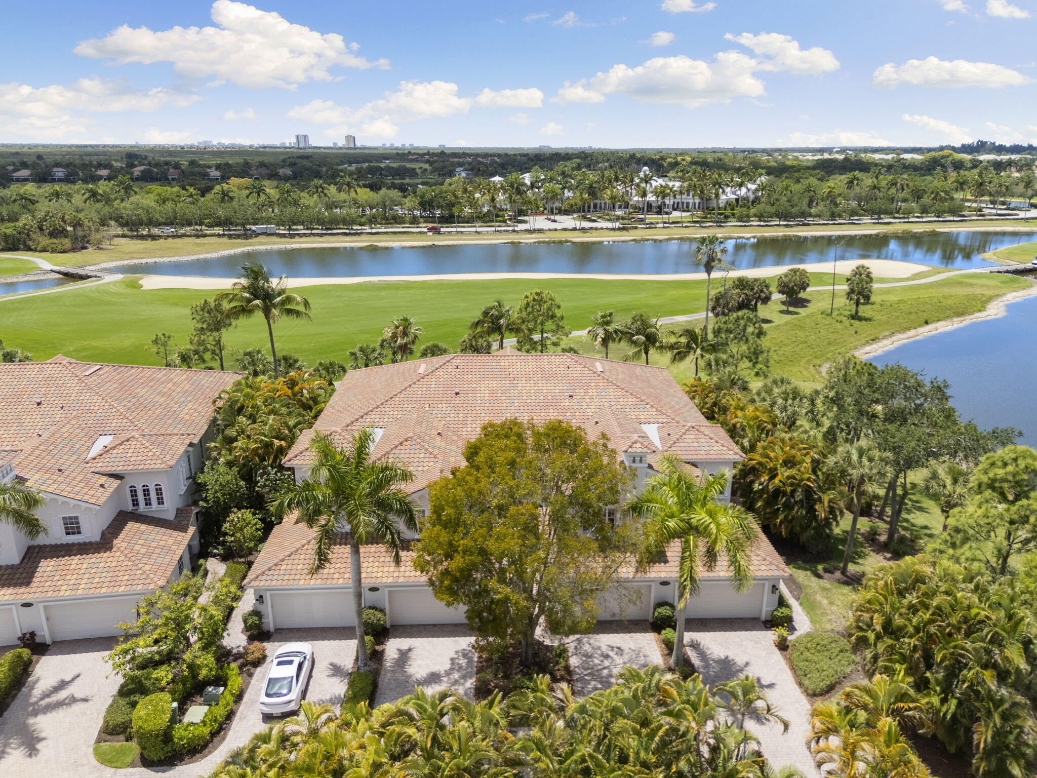 9066 Cascada Way, Unit 101 Naples, FL 34114 - Photo 30 of 51 an aerial view of a house with garden space and ocean view
