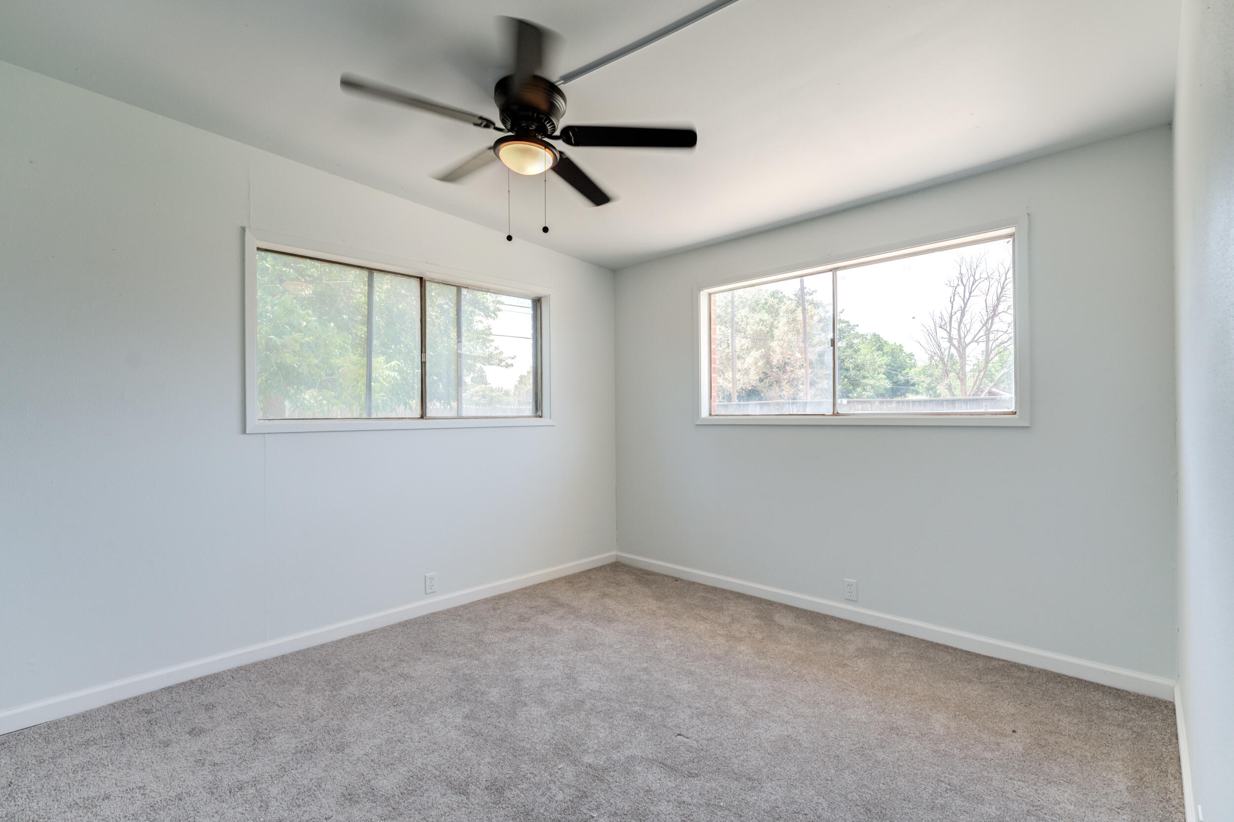 2525 63rd Street Lubbock, TX 79413 - Photo 12 of 14 a view of an empty room with a window