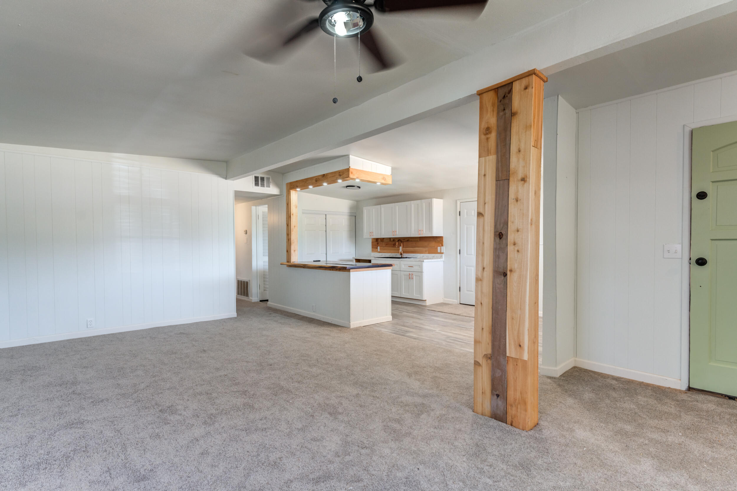 2525 63rd Street Lubbock, TX 79413 - Photo 4 of 14 a view of a kitchen with a refrigerator