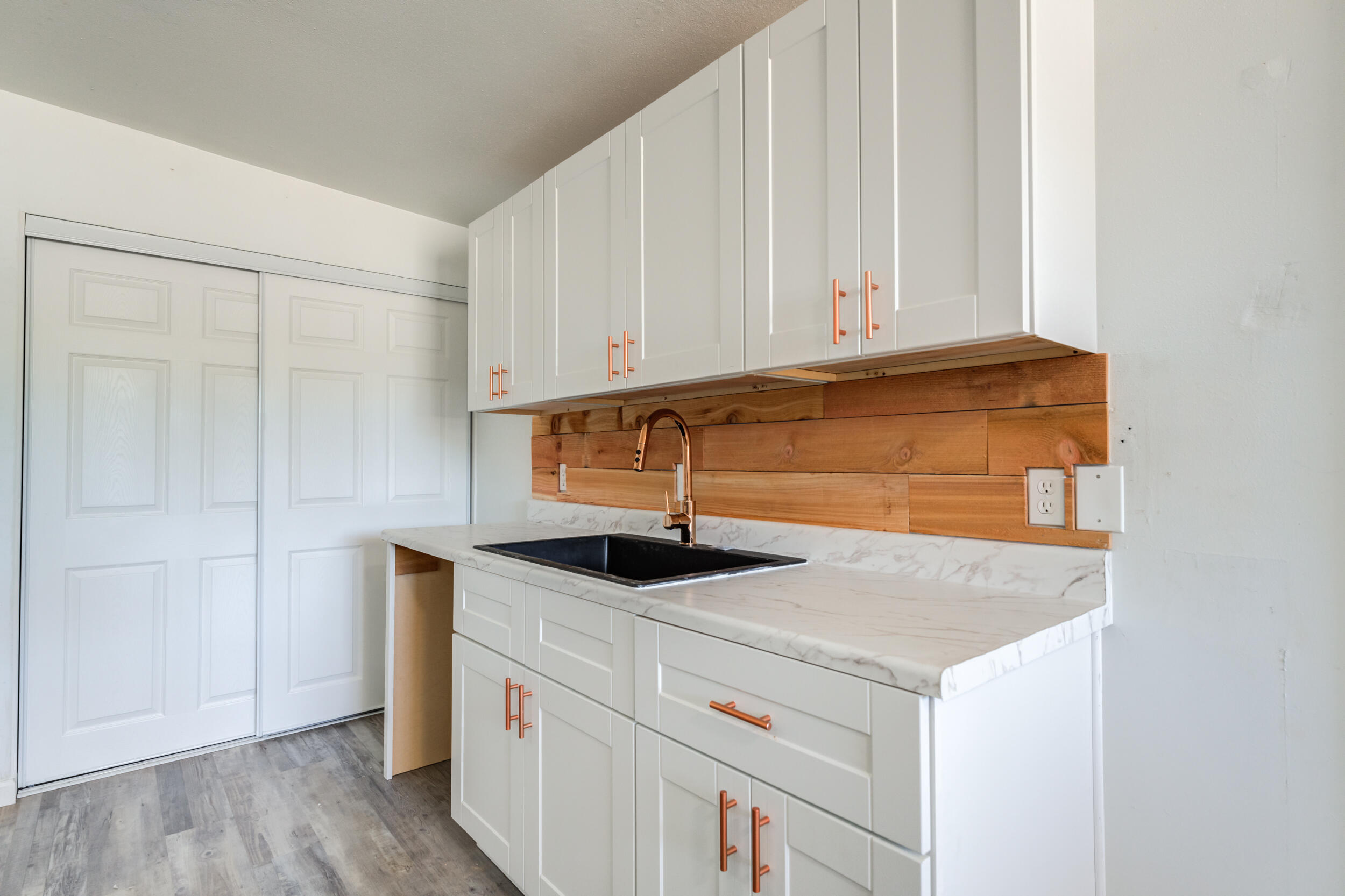 2525 63rd Street Lubbock, TX 79413 - Photo 8 of 14 a kitchen with a sink and cabinets