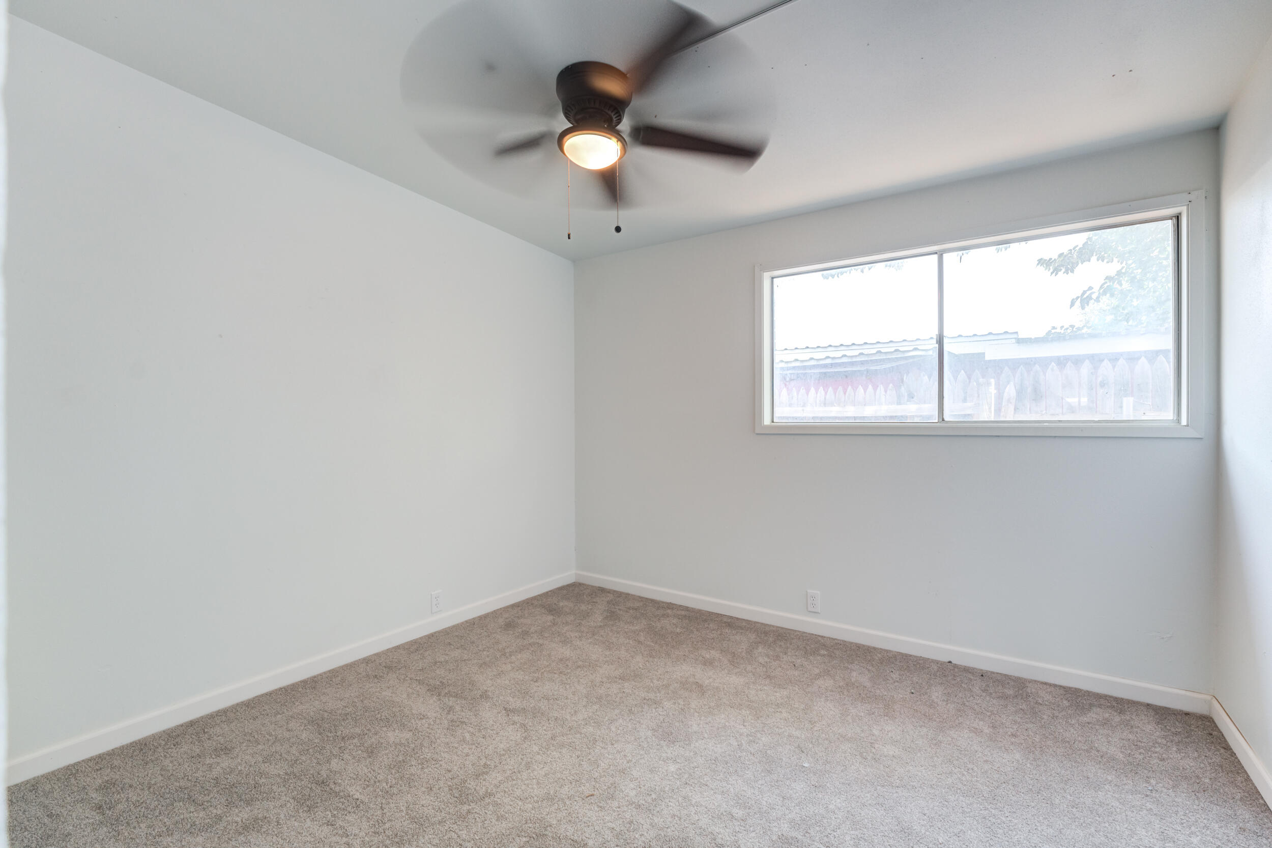 2525 63rd Street Lubbock, TX 79413 - Photo 10 of 14 an empty room with a window