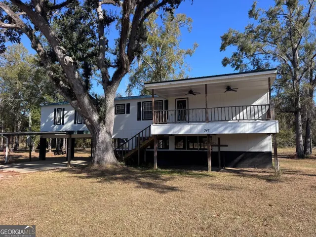 a front view of a house with a balcony