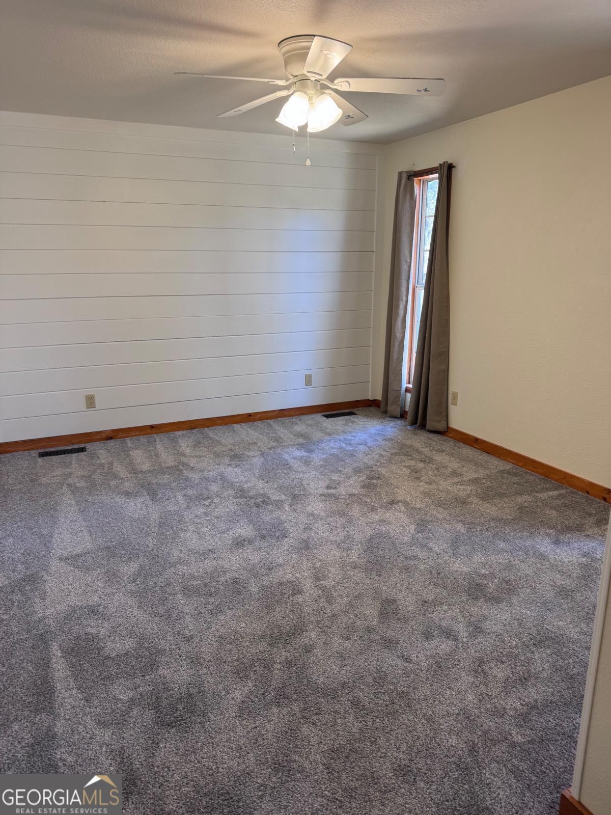 347 Benton Powell Road Uvalda, GA 30473 - Photo 17 of 39 an empty room with windows and fan