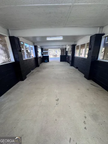 a view of a house with a tree