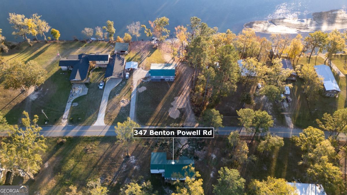 347 Benton Powell Road Uvalda, GA 30473 - Photo 35 of 39 a view of a house with a yard and a fountain