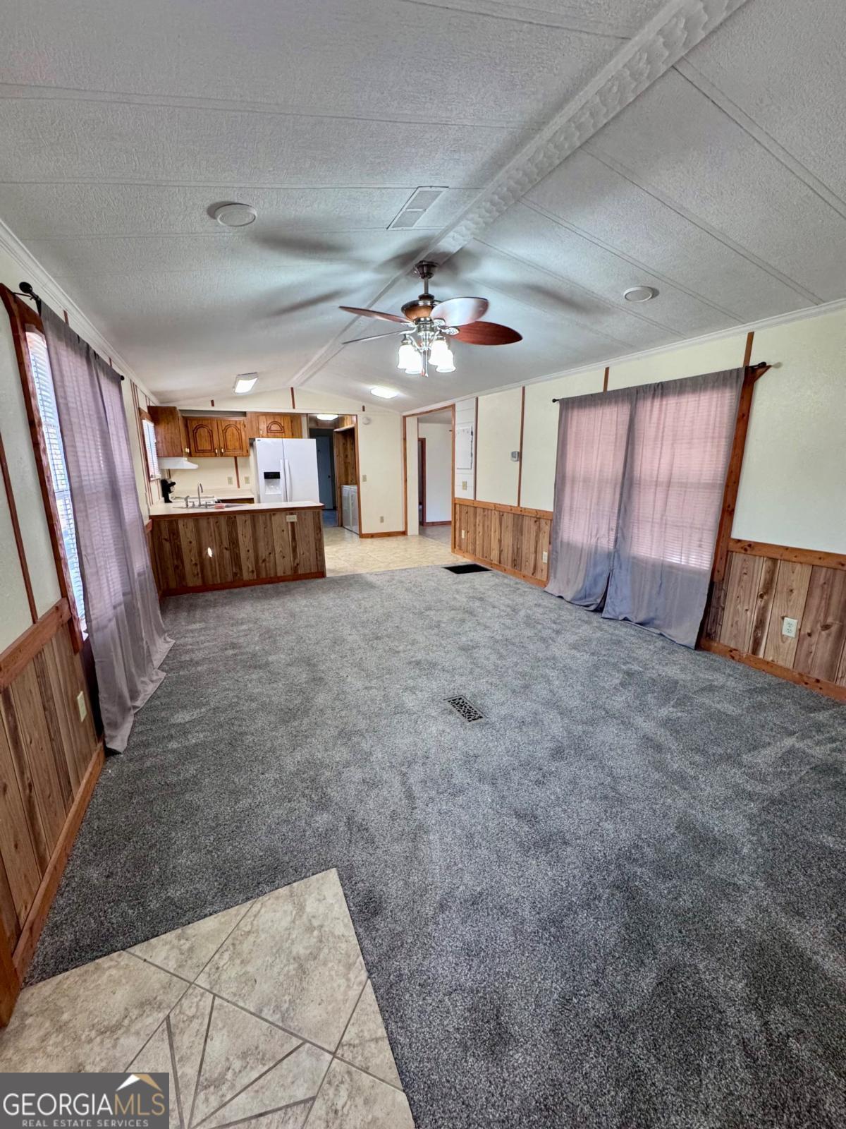 347 Benton Powell Road Uvalda, GA 30473 - Photo 4 of 39 a view of a livingroom with furniture and staircase
