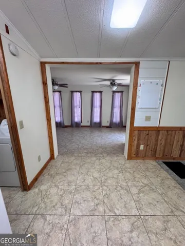 a kitchen with a stove a refrigerator and a sink