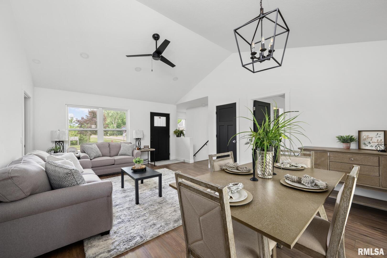 813 Williams Way Carbon Cliff, IL 61239 - Photo 2 of 36 a living room with furniture and a chandelier