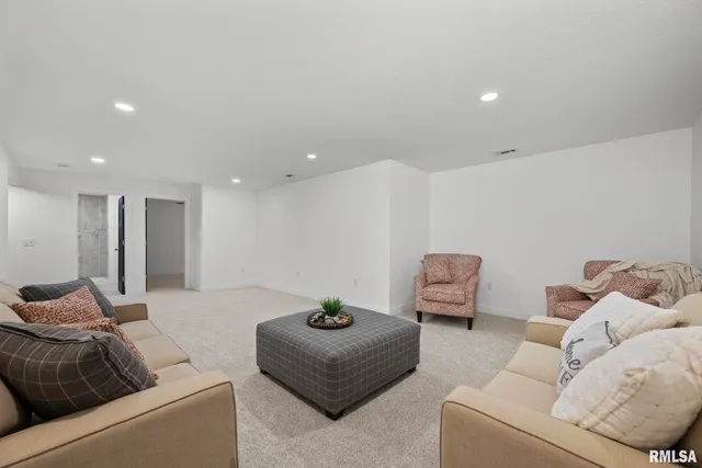 a room with furniture and a couch