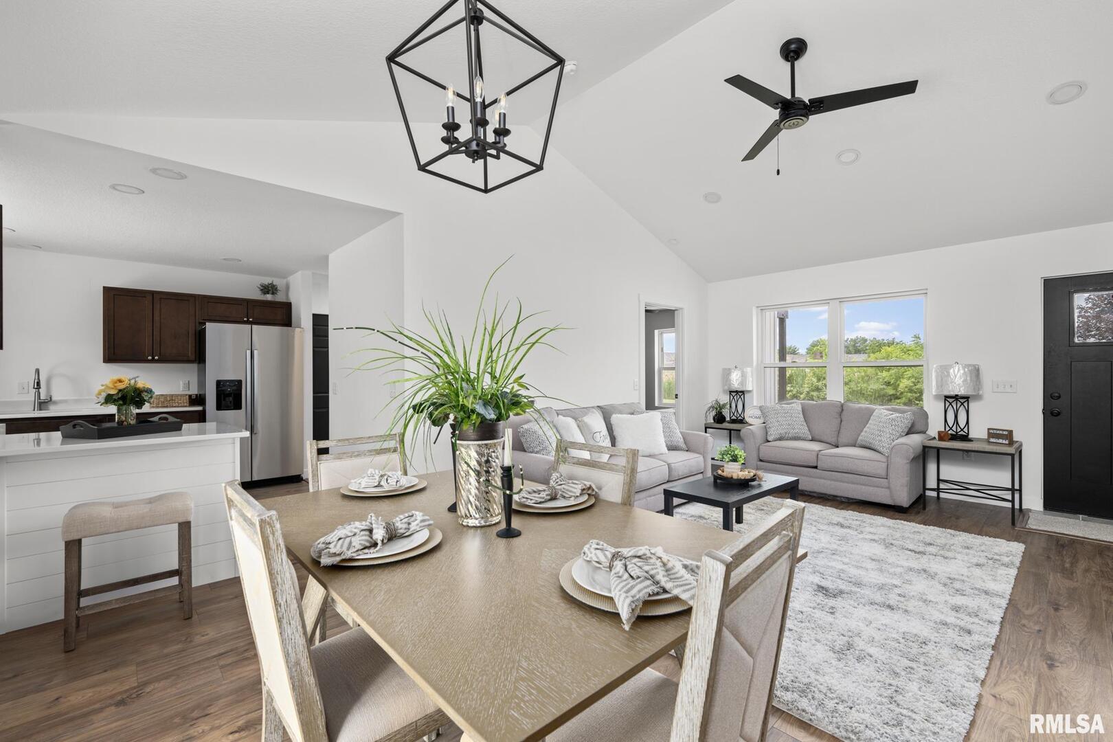 813 Williams Way Carbon Cliff, IL 61239 - Photo 6 of 36 a living room with furniture and a large window