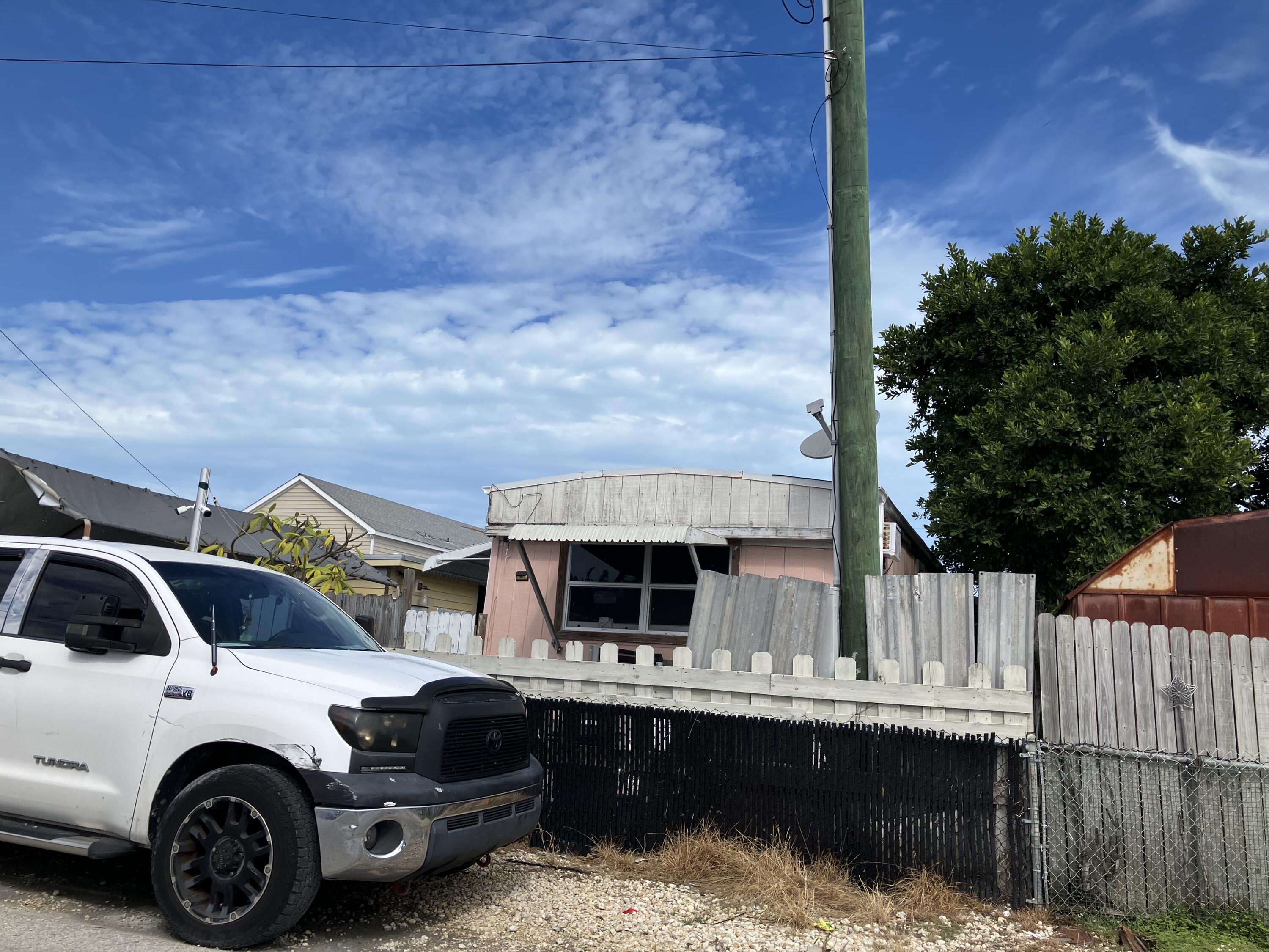 B38 9th Avenue Key West, FL 33040 - Photo 1 of 3 a car parked in front of a house