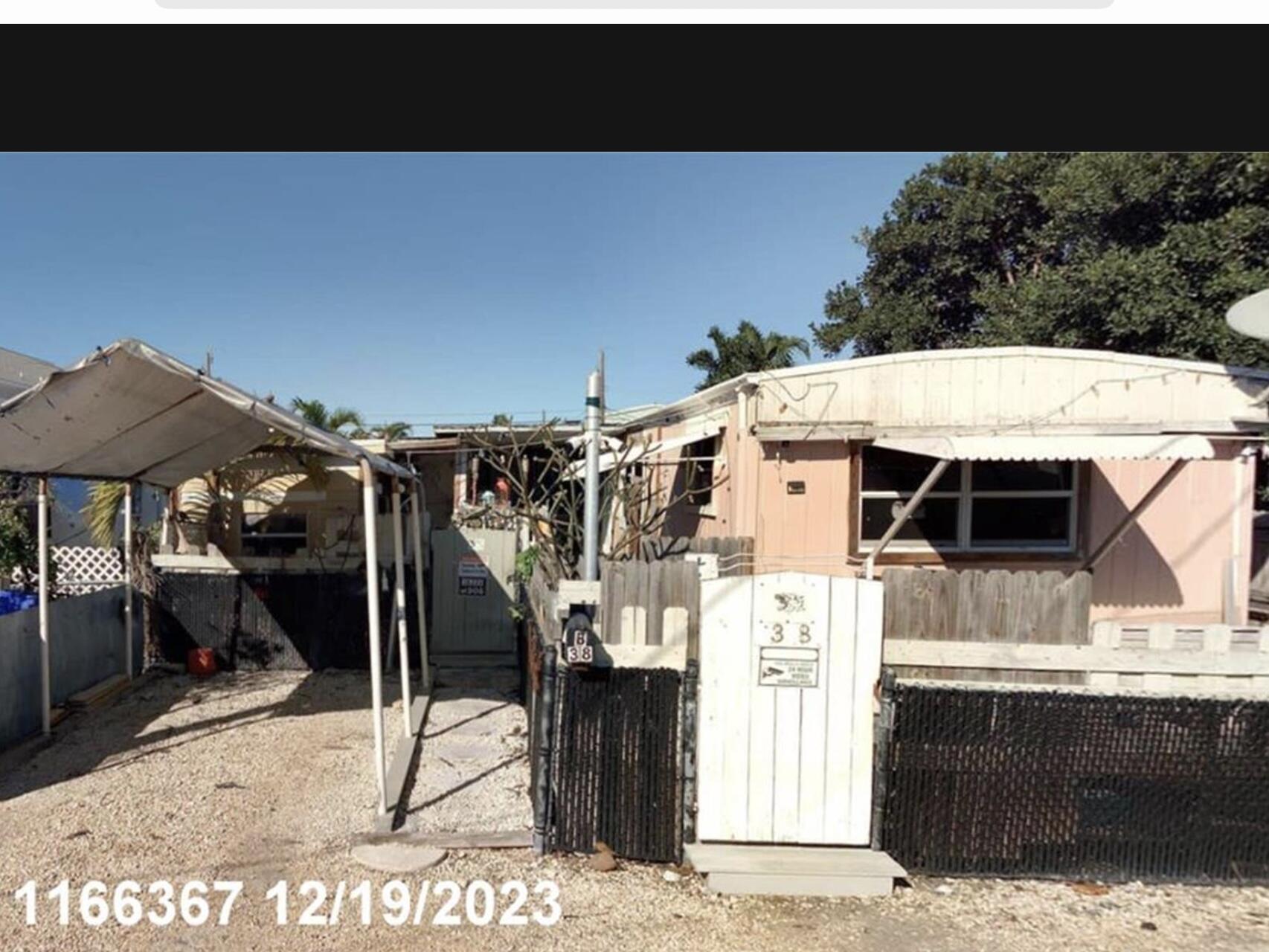 B38 9th Avenue Key West, FL 33040 - Photo 2 of 3 a view of a house with a balcony