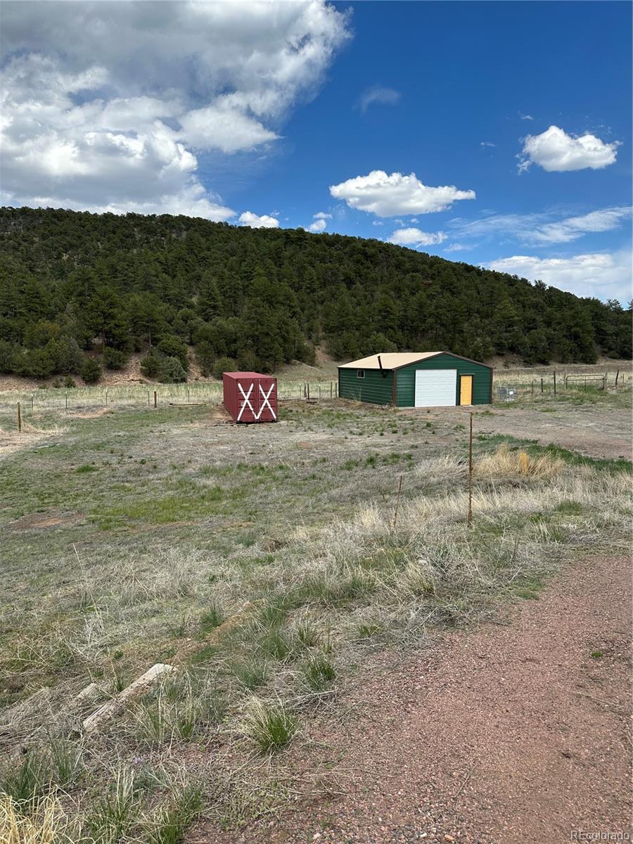7878 Copper Gulch Road Cotopaxi, CO 81223 - Photo 6 of 17 a view of a terrace with a yard