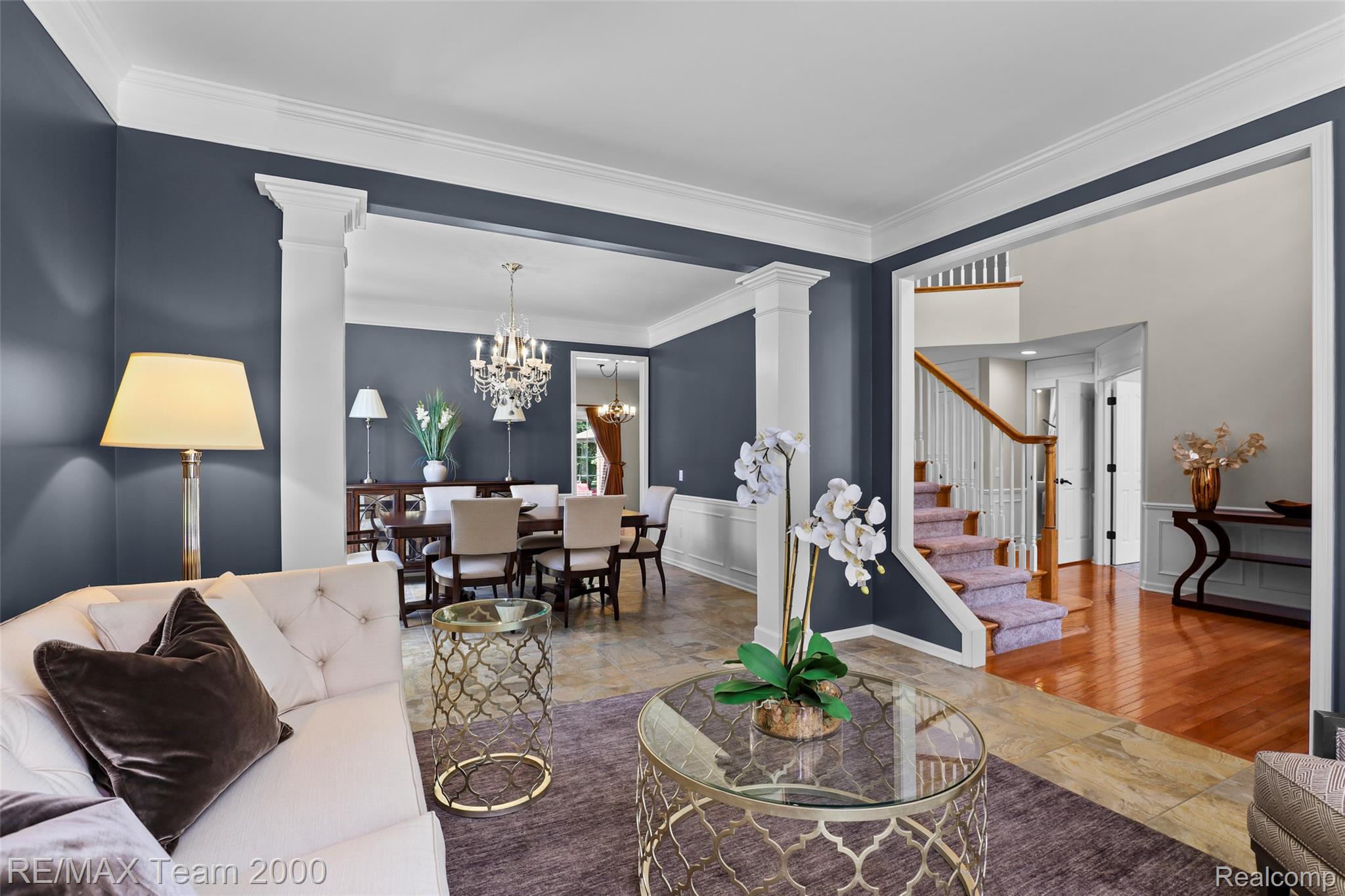 1248 Lasalle Road Canton, MI 48187 - Photo 22 of 67 Multi-room interior featuring crown molding, columns, and wainscoting