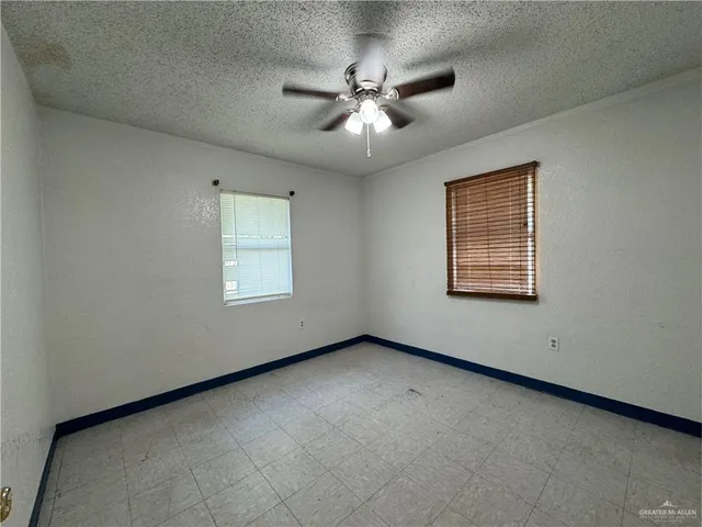 a bathroom with a toilet sink and shower