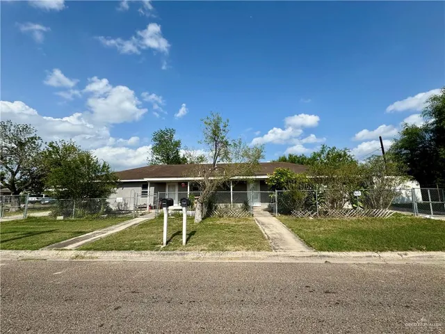 a view of a house with a swimming pool