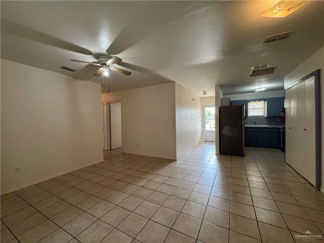 a kitchen with stainless steel appliances granite countertop a sink and a stove