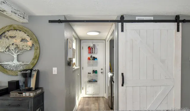 a view of a hallway with entryway