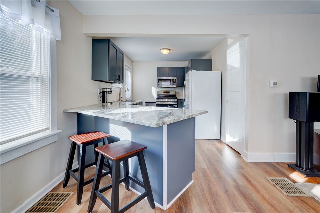 172 Wildmere Road Irondequoit, NY 14617 - Photo 5 of 30 Breakfast bar/Island