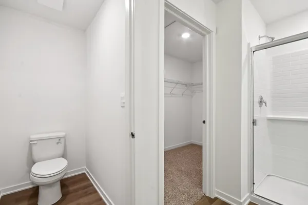 a bathroom with a toilet and a sink