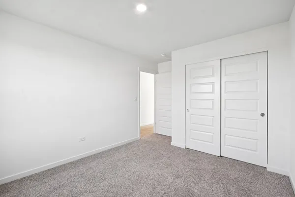 an empty room with closet
