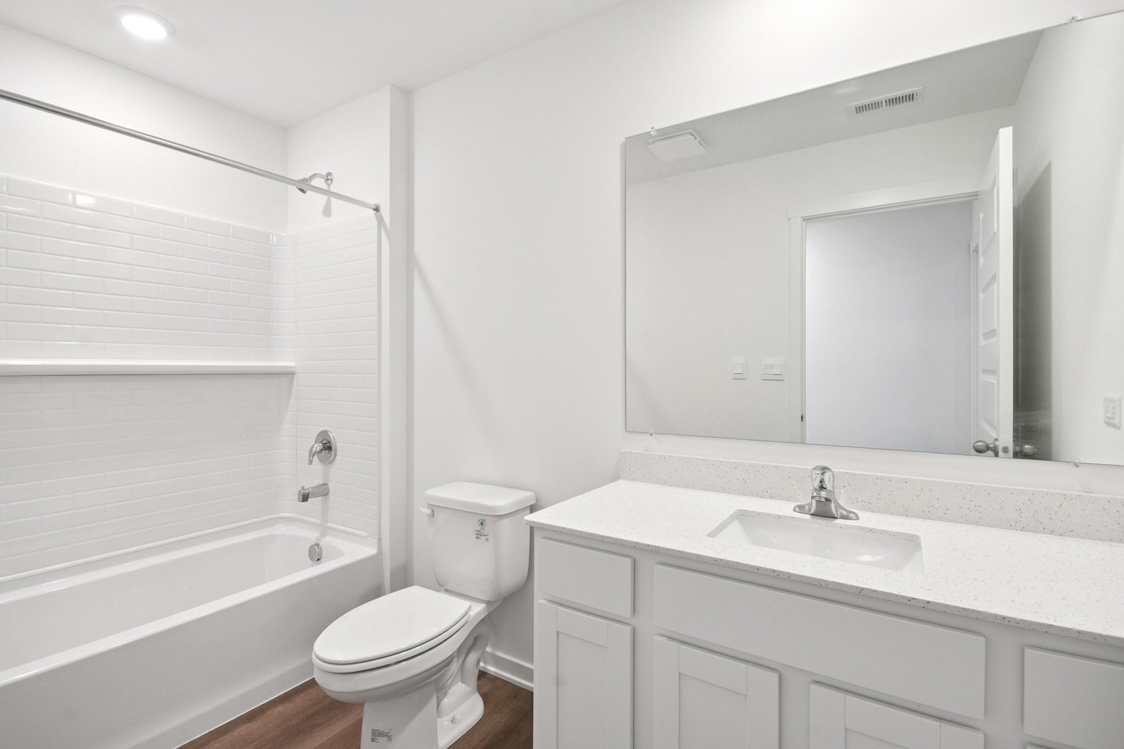 13530 Coronado Circle Plainfield, IL 60544 - Photo 29 of 49 a bathroom with a sink toilet vanity and shower