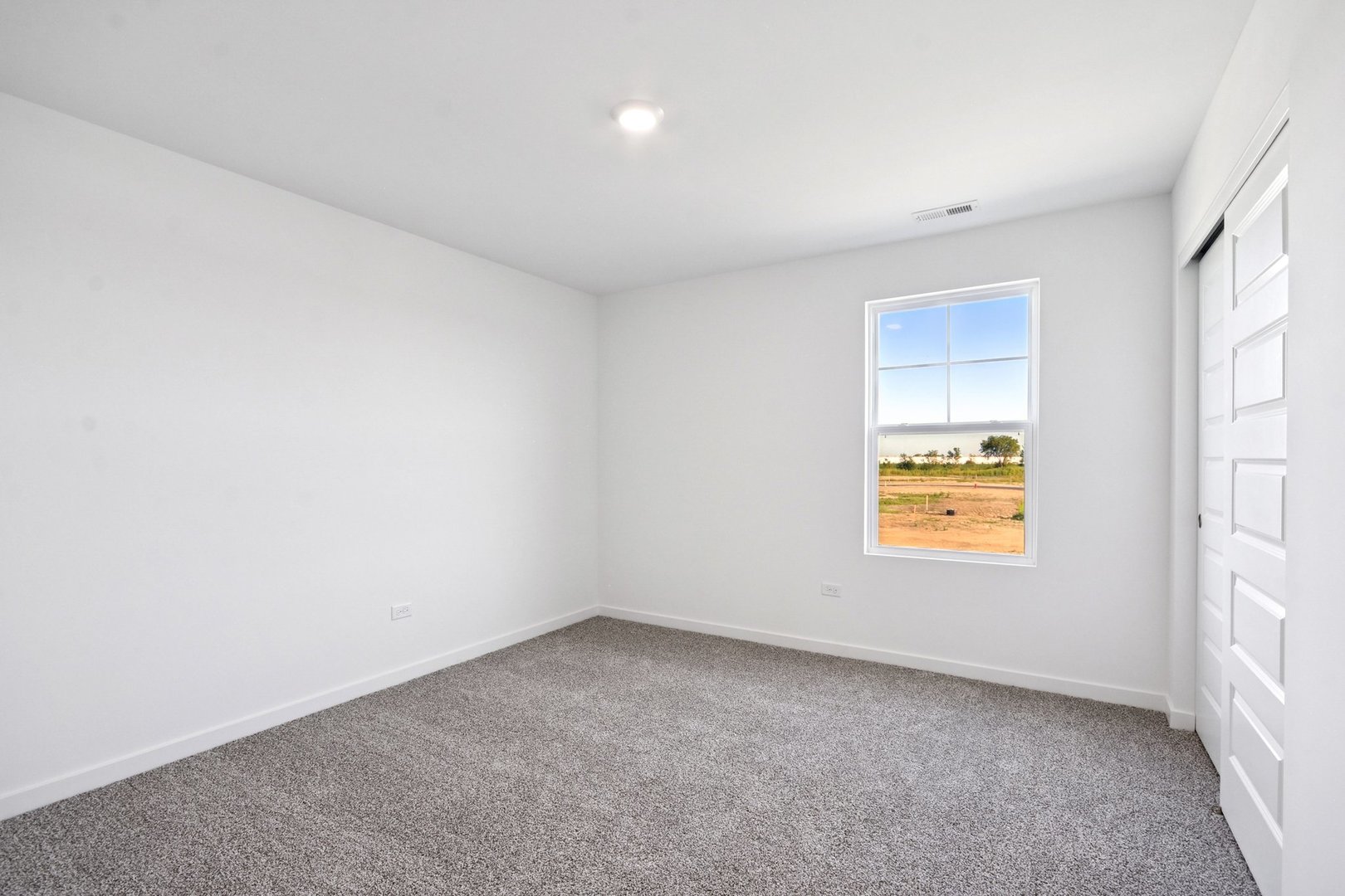 13530 Coronado Circle Plainfield, IL 60544 - Photo 30 of 49 an empty room with a window