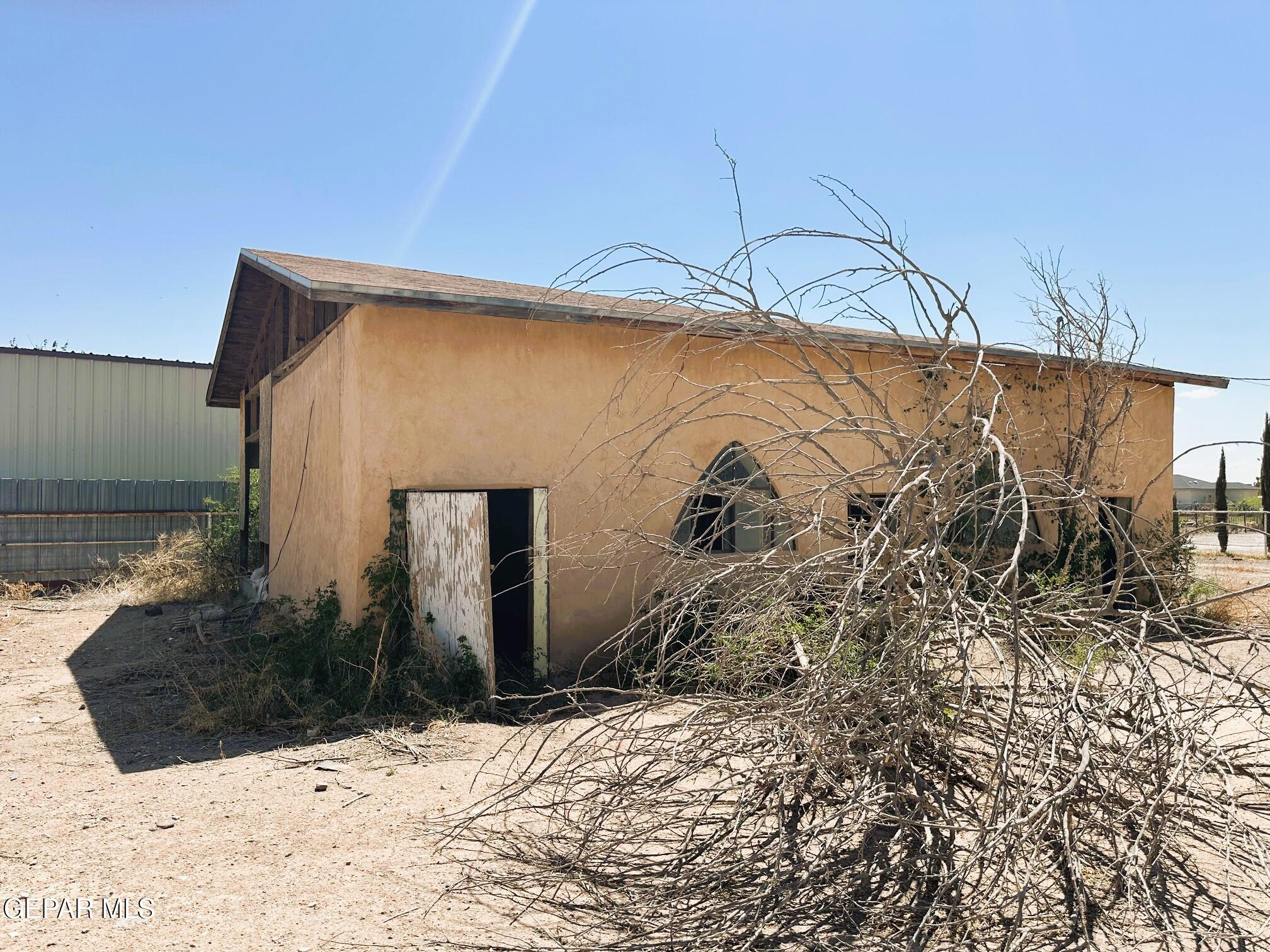 250 Trotter Court Anthony, NM 88021 - Photo 7 of 8 a view of a backyard of the house