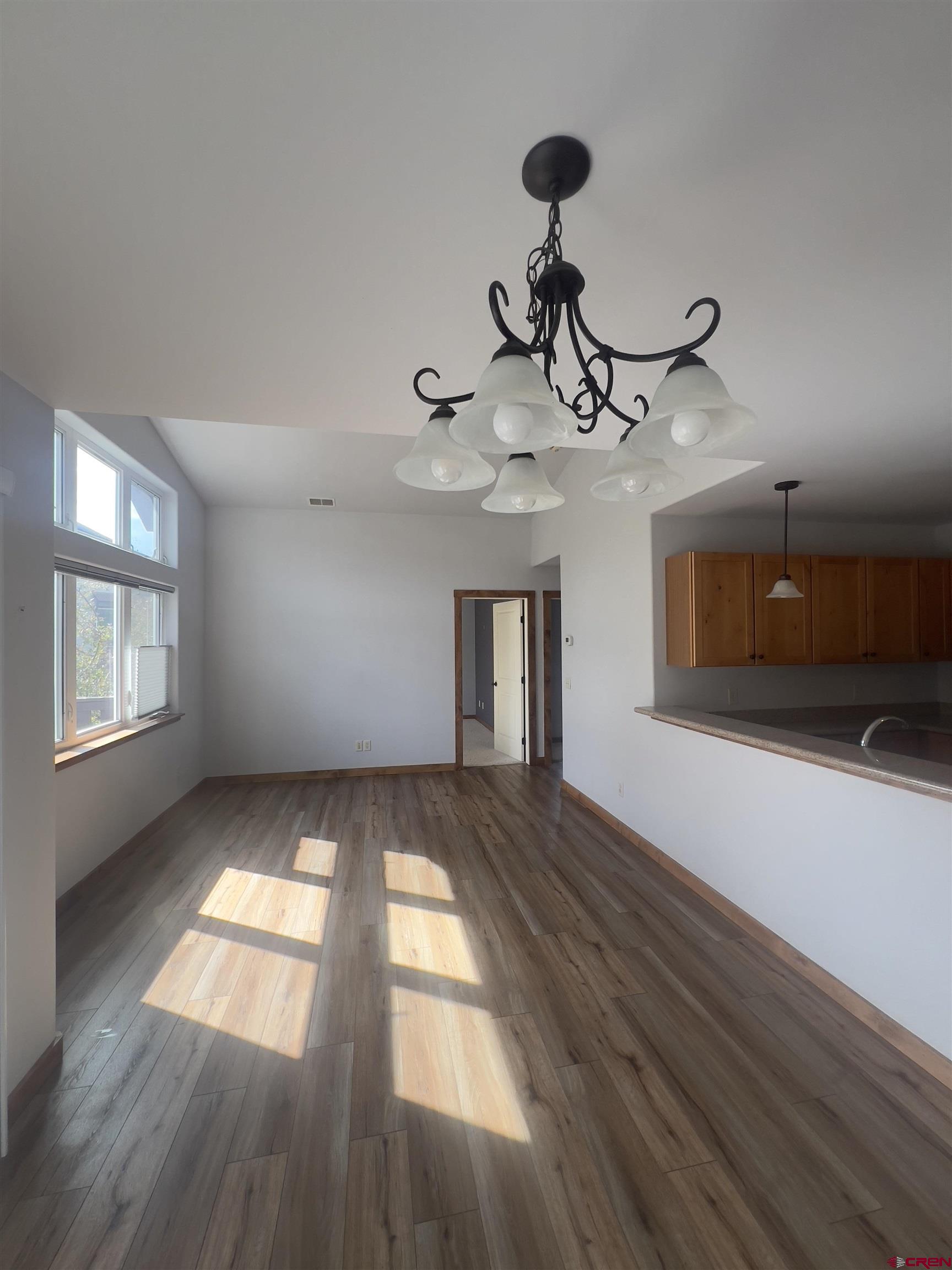 540 Redcliff Circle, Unit E 203 Ridgway, CO 81432 - Photo 2 of 36 a view of entryway and hall with wooden floor