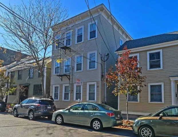 a car parked in front of a building
