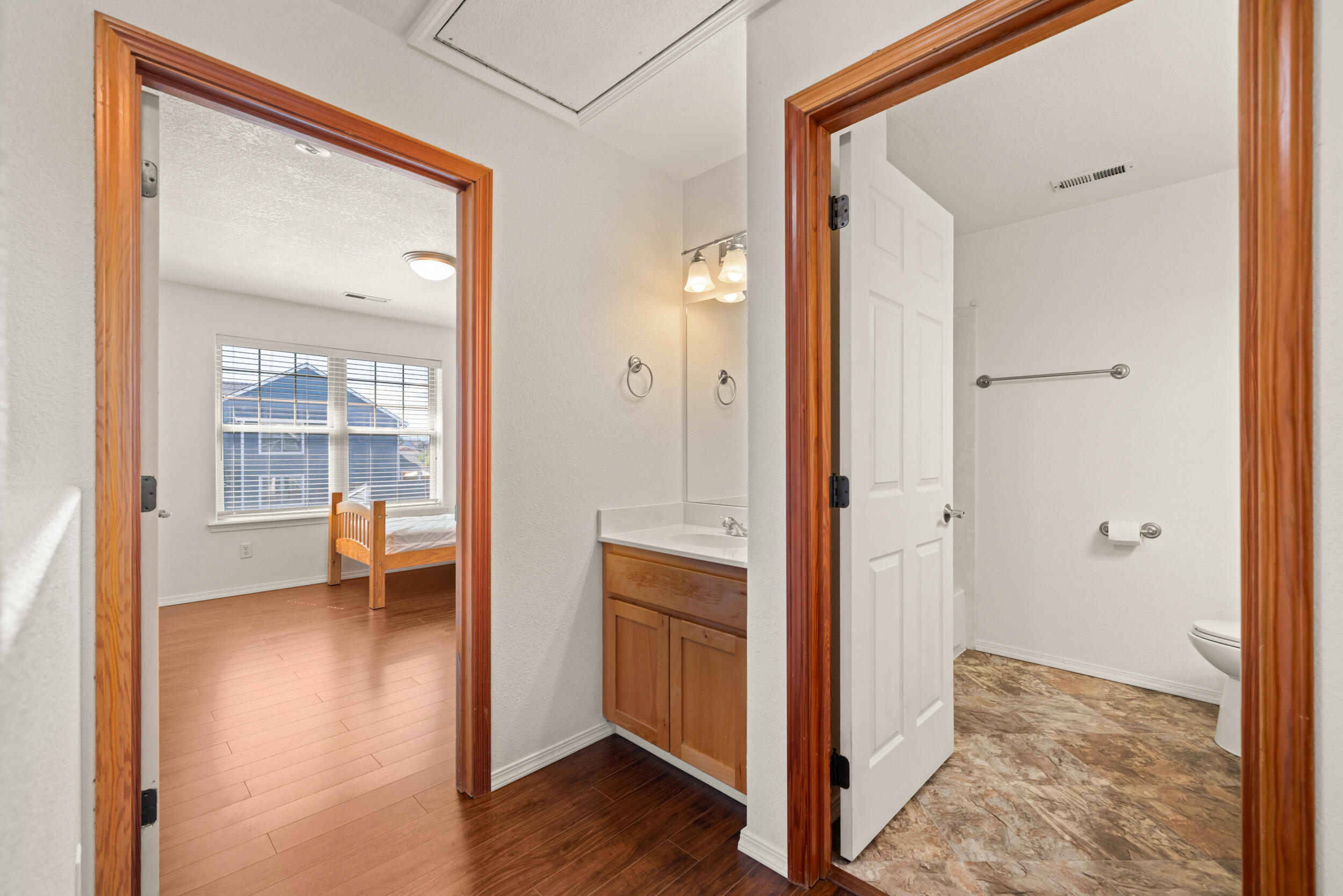 450 Midway Road, Unit 33 Medford, OR 97501 - Photo 16 of 21 a view of a hallway and a livingroom with wooden floor