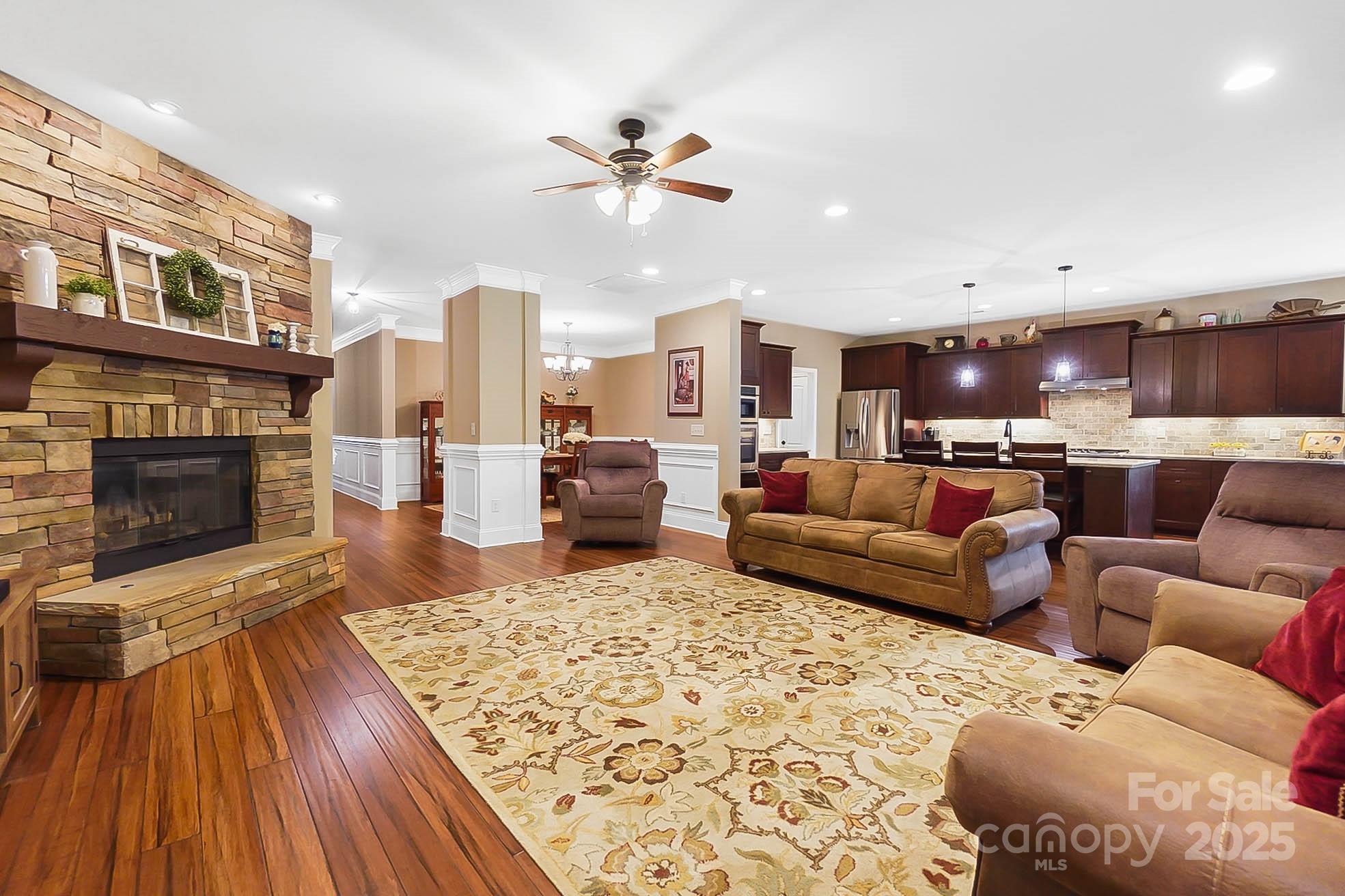 7305 Indian Trail Fairview Road Indian Trail, NC 28079 - Photo 15 of 48 a living room with furniture and a fireplace