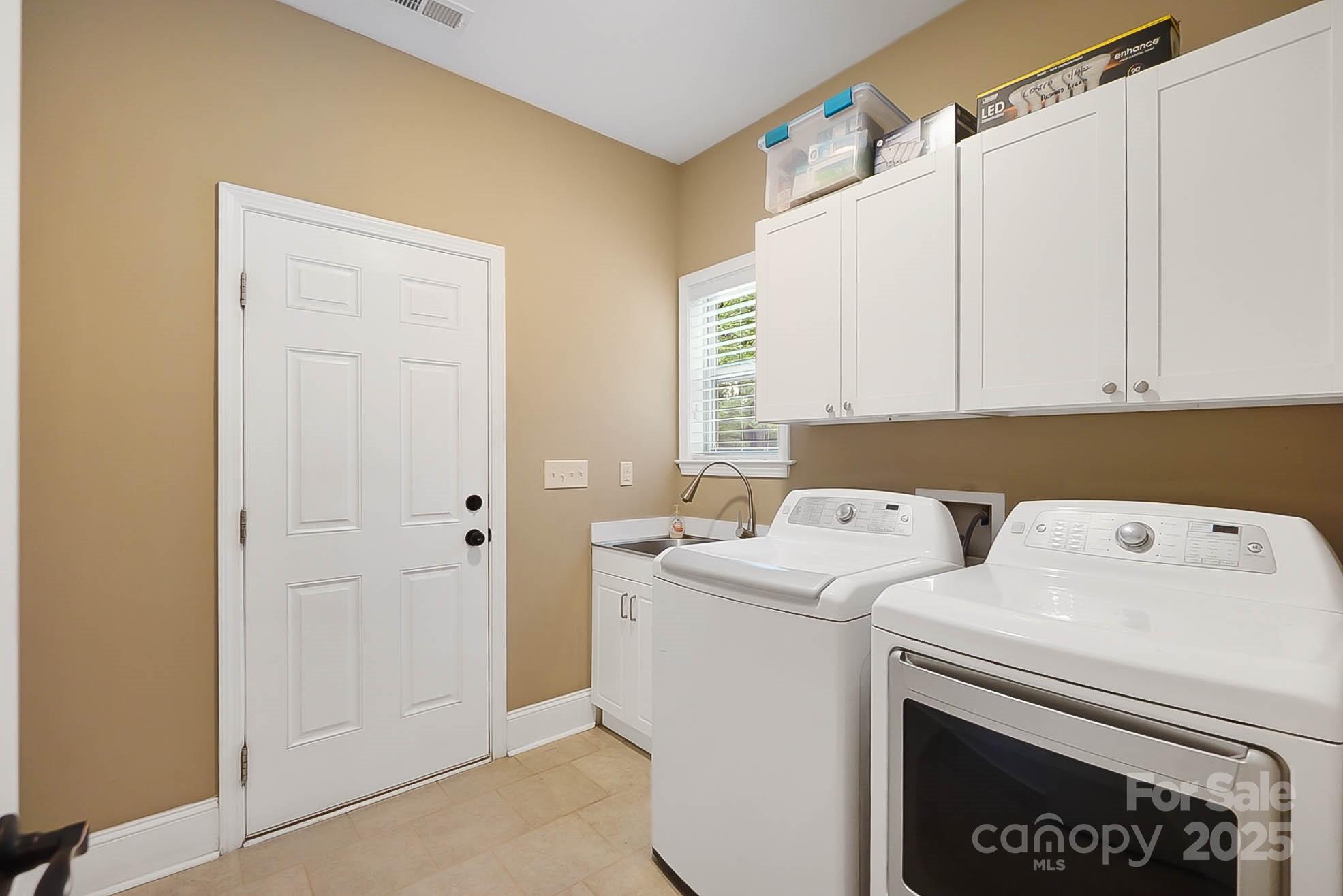 7305 Indian Trail Fairview Road Indian Trail, NC 28079 - Photo 23 of 48 a utility room with dryer and washer
