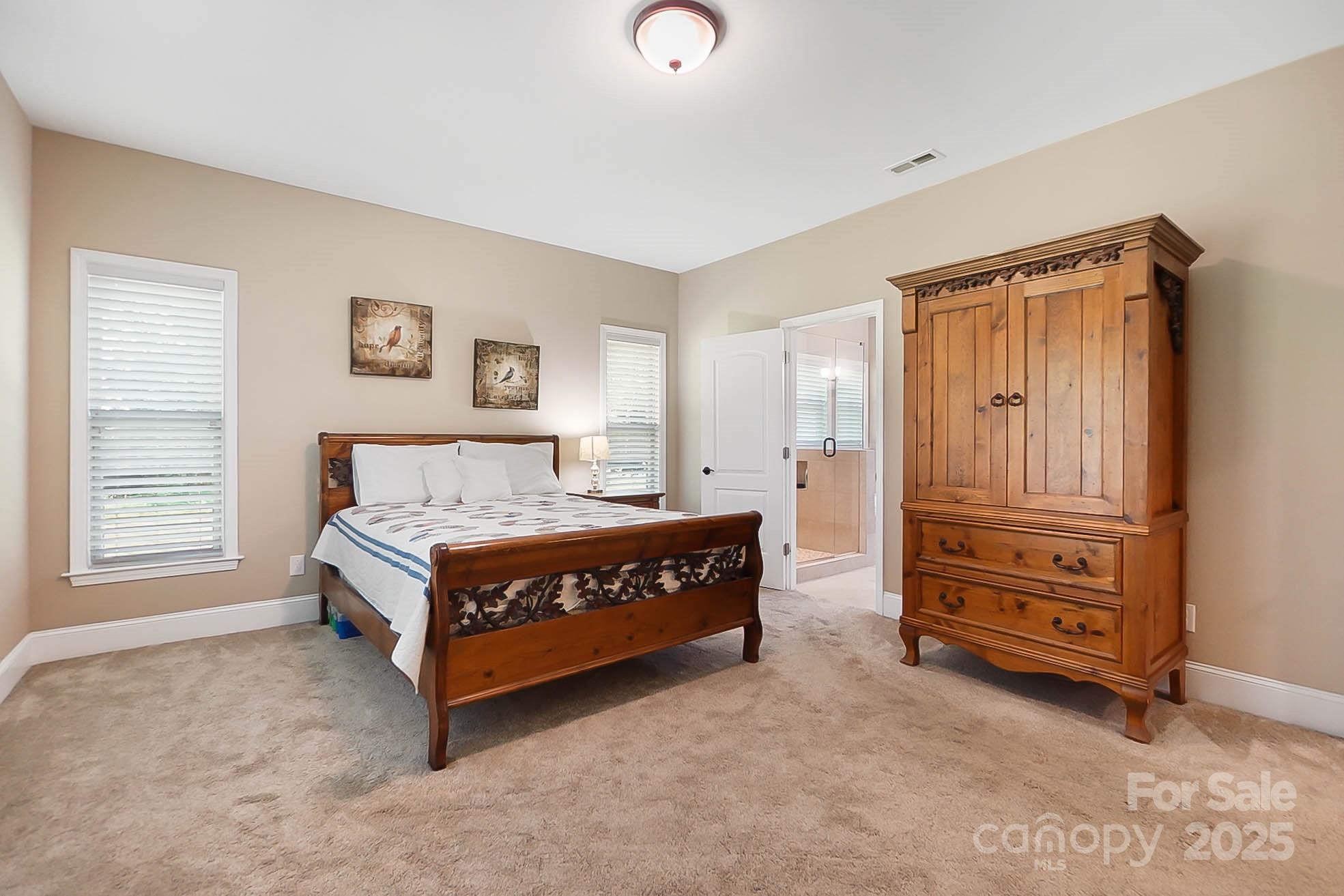 7305 Indian Trail Fairview Road Indian Trail, NC 28079 - Photo 24 of 48 a bedroom with a bed and a window