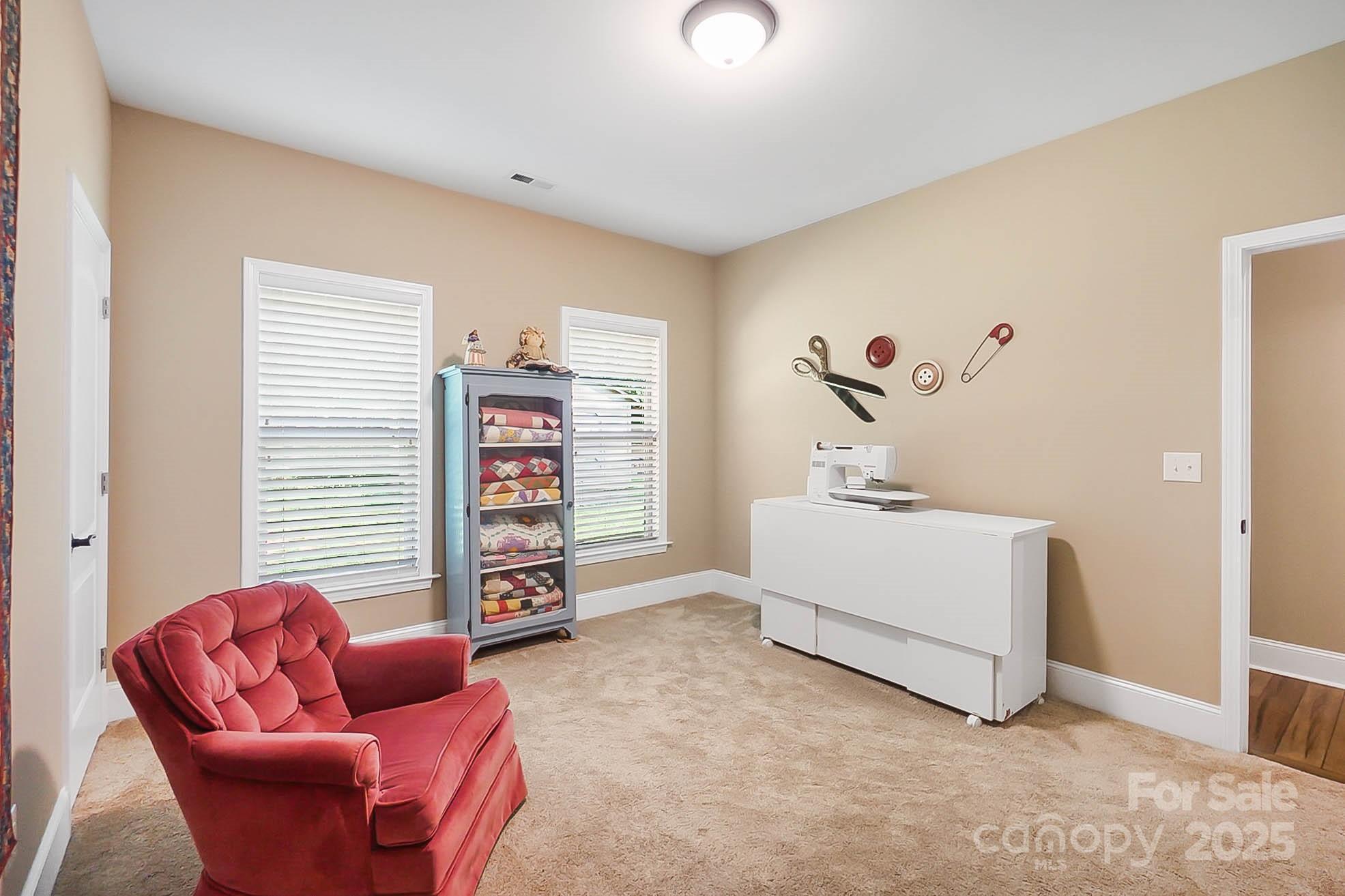 7305 Indian Trail Fairview Road Indian Trail, NC 28079 - Photo 29 of 48 a living room with furniture and white walls