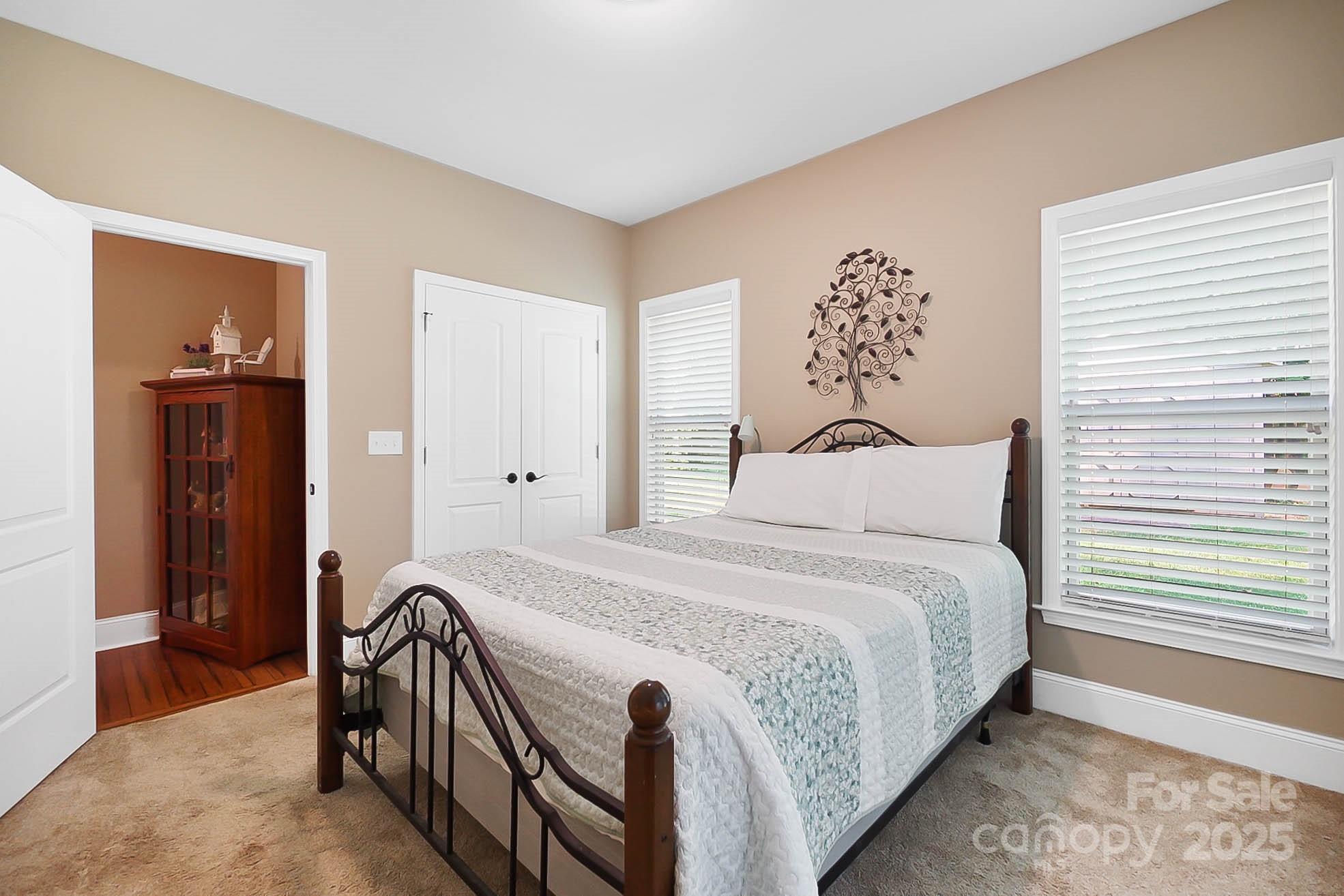 7305 Indian Trail Fairview Road Indian Trail, NC 28079 - Photo 32 of 48 a bedroom with a bed and a window