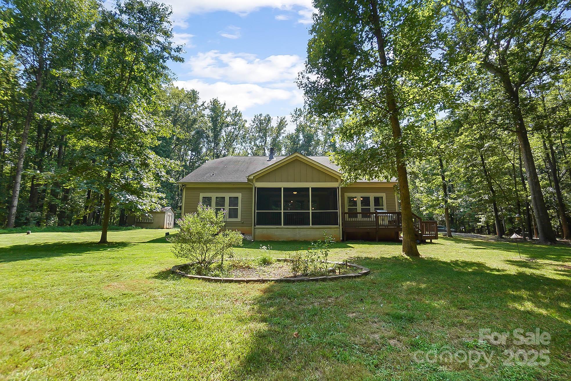 7305 Indian Trail Fairview Road Indian Trail, NC 28079 - Photo 38 of 48 a front view of a house with a yard