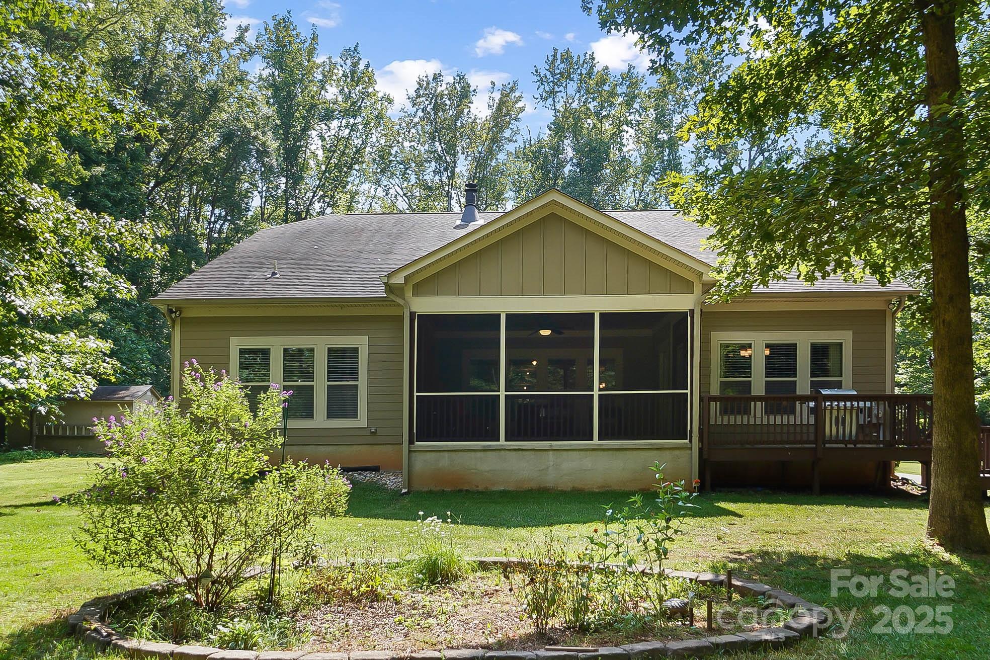 7305 Indian Trail Fairview Road Indian Trail, NC 28079 - Photo 39 of 48 a view of a house with a yard