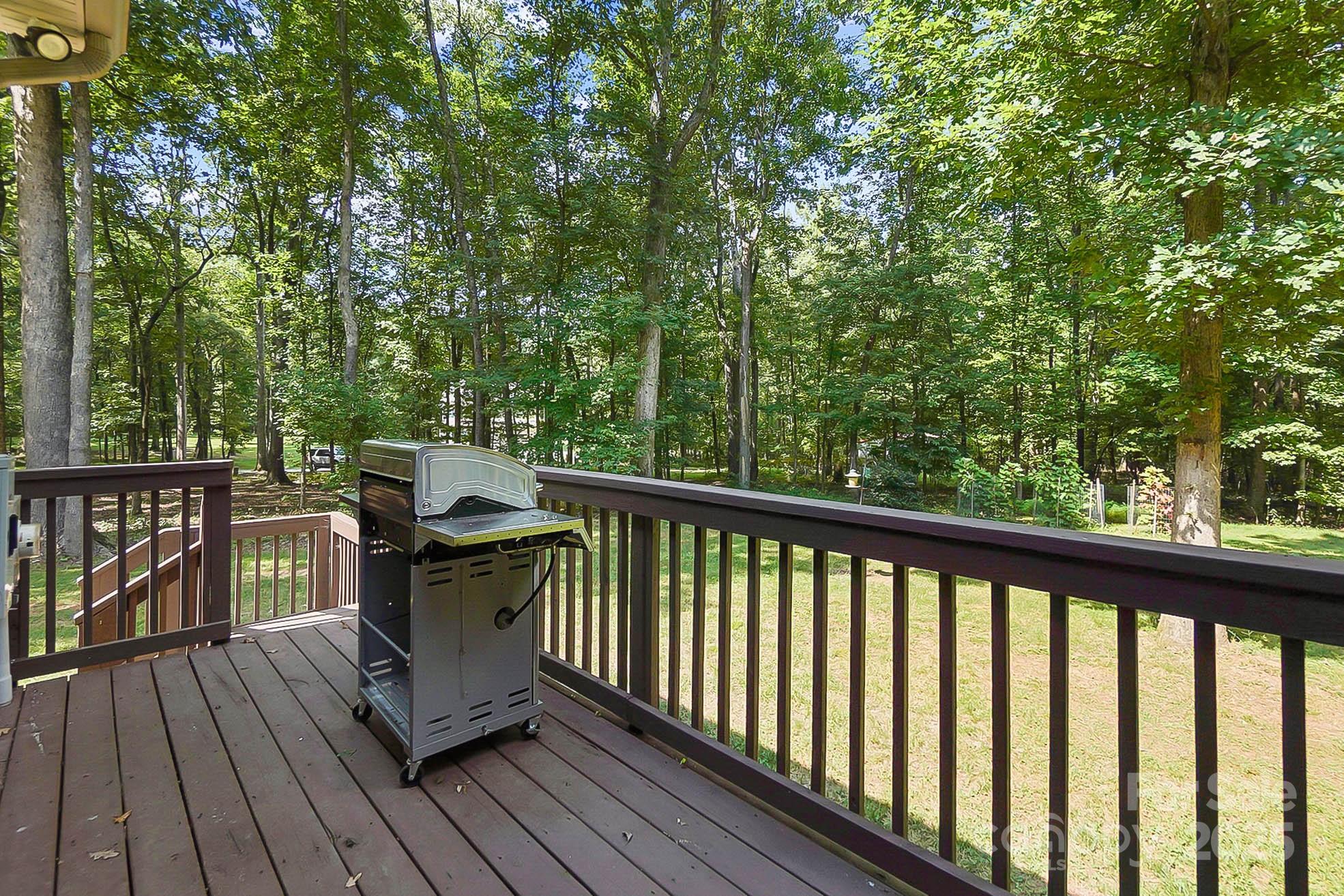 7305 Indian Trail Fairview Road Indian Trail, NC 28079 - Photo 40 of 48 a view of a two chairs in the deck