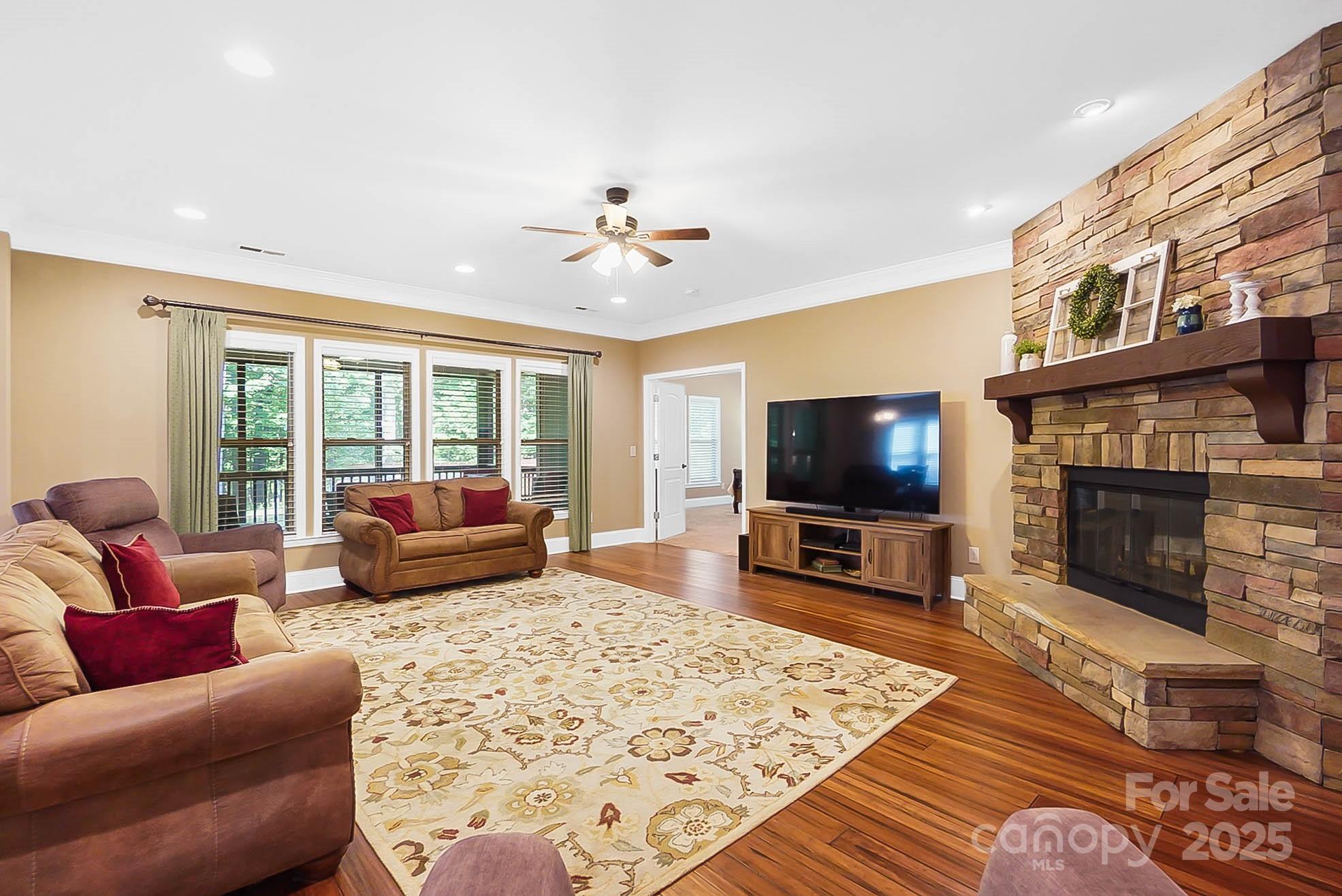 7305 Indian Trail Fairview Road Indian Trail, NC 28079 - Photo 4 of 48 a living room with furniture and a flat screen tv