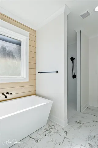a bathroom with a sink double vanity and a mirror