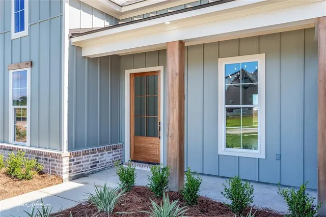 a view of a house with a small porch
