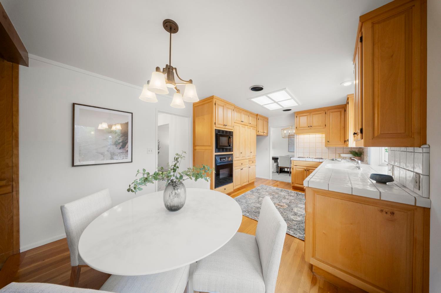 929 Terrace Place Modesto, CA 95350 - Photo 12 of 35 a dining room with furniture and window